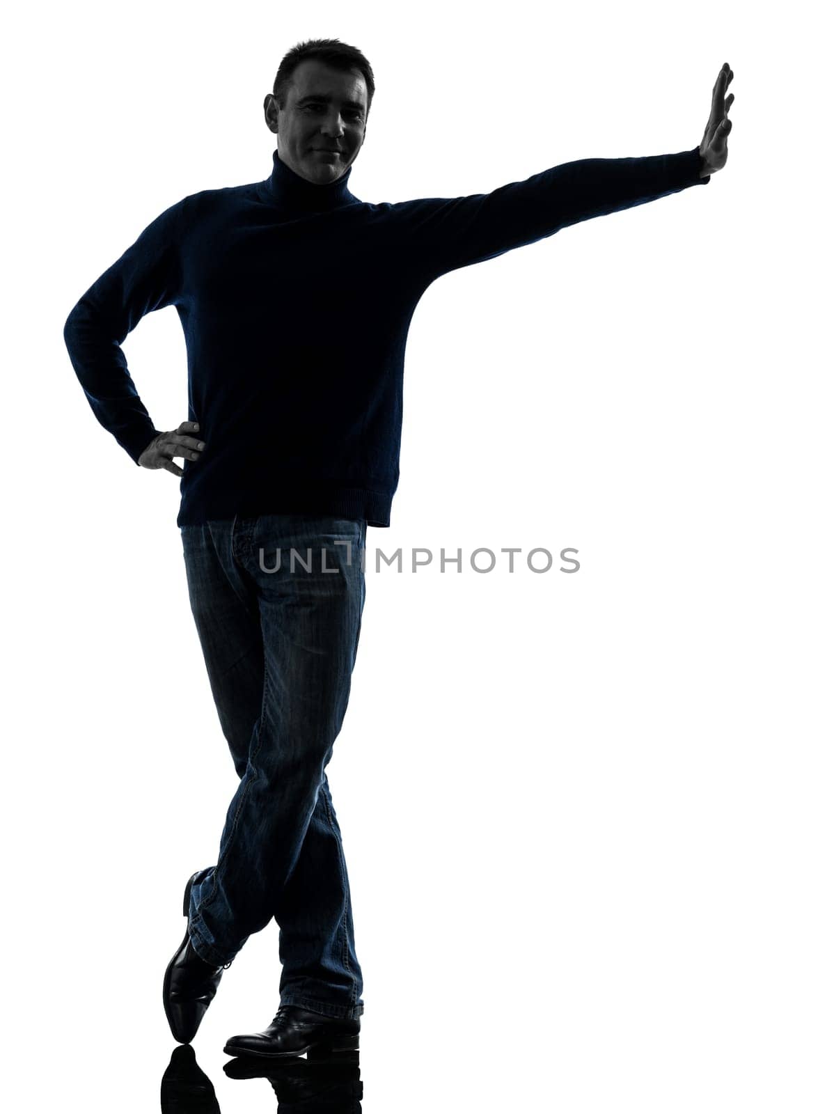 one causasian man full length in silhouette studio isolated on white background