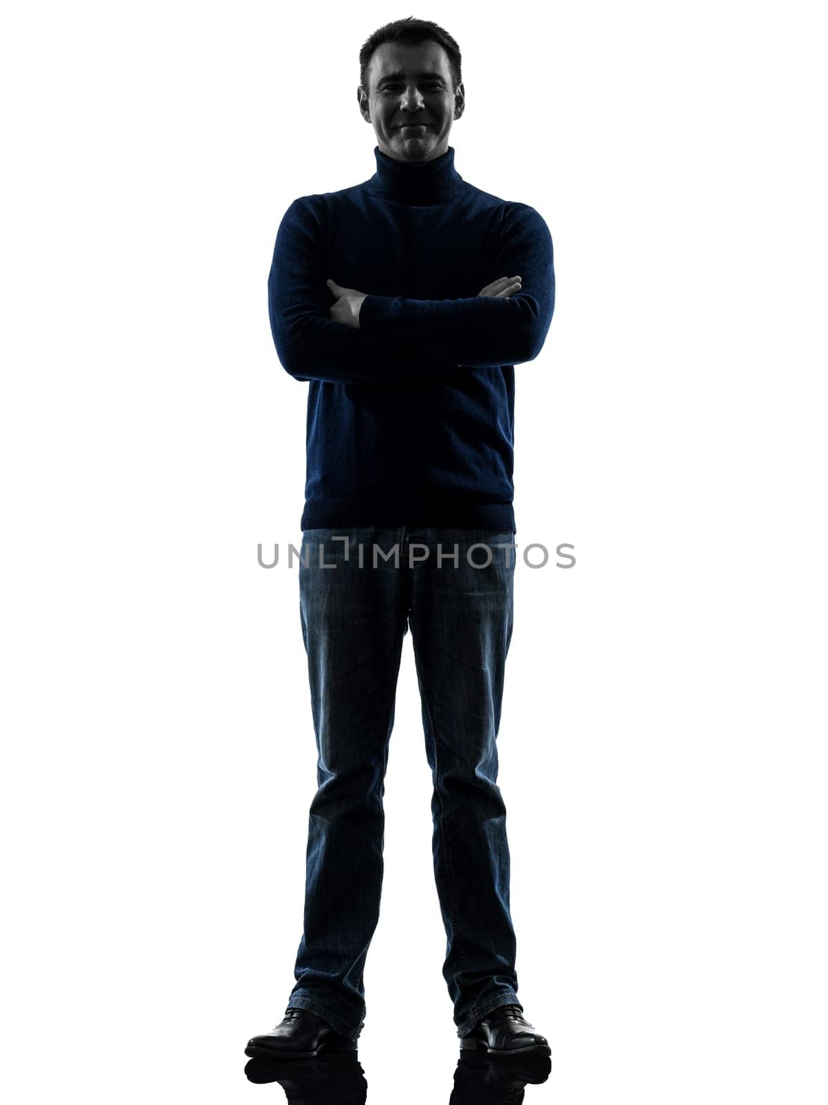 one causasian man full length in silhouette studio isolated on white background