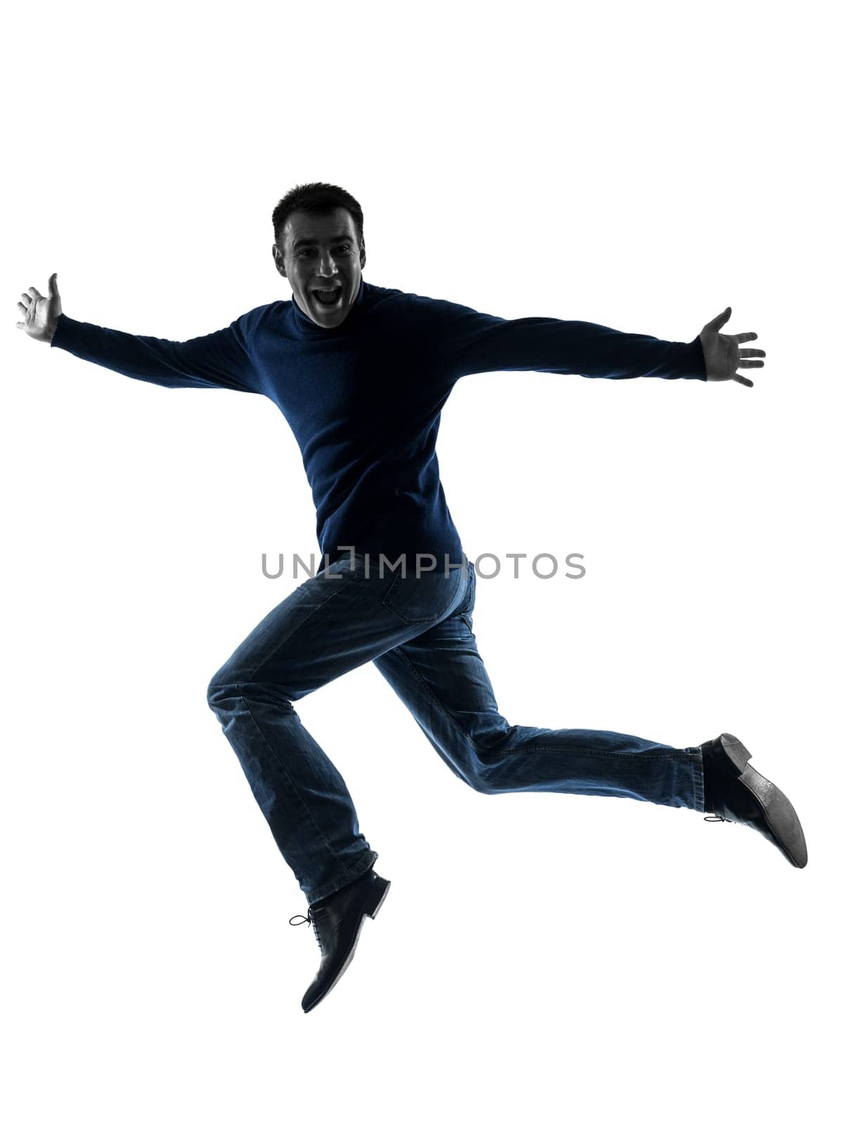 one causasian man full length in silhouette studio isolated on white background