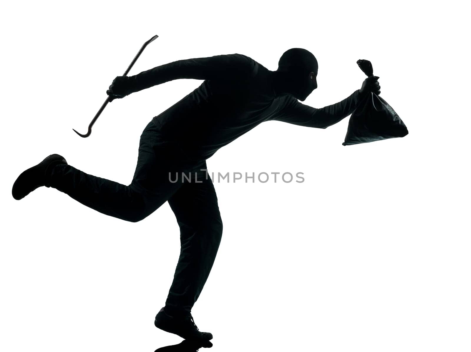 thief criminal terrorist in silhouette studio isolated on white background