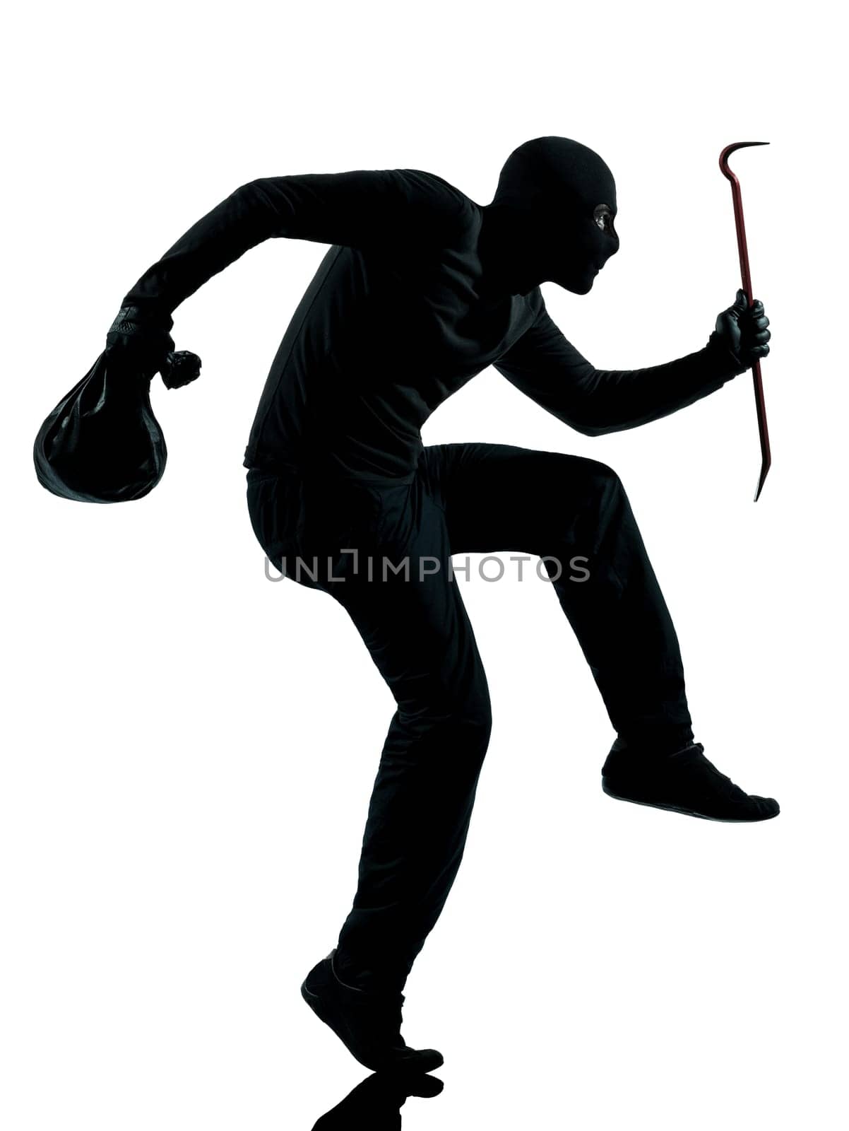 thief criminal terrorist in silhouette studio isolated on white background
