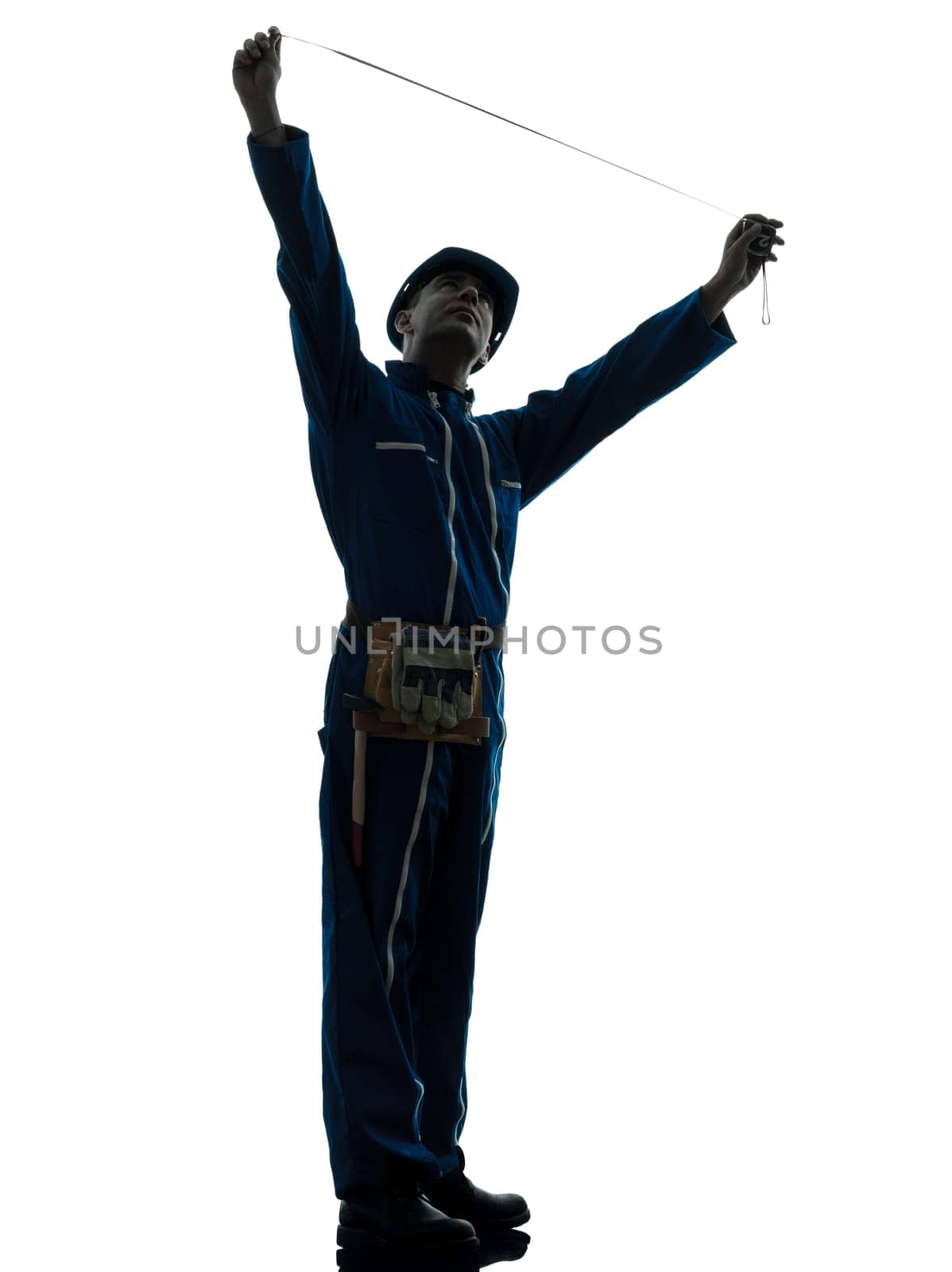 one caucasian man construction worker pointing showing silhouette portrait in studio on white background