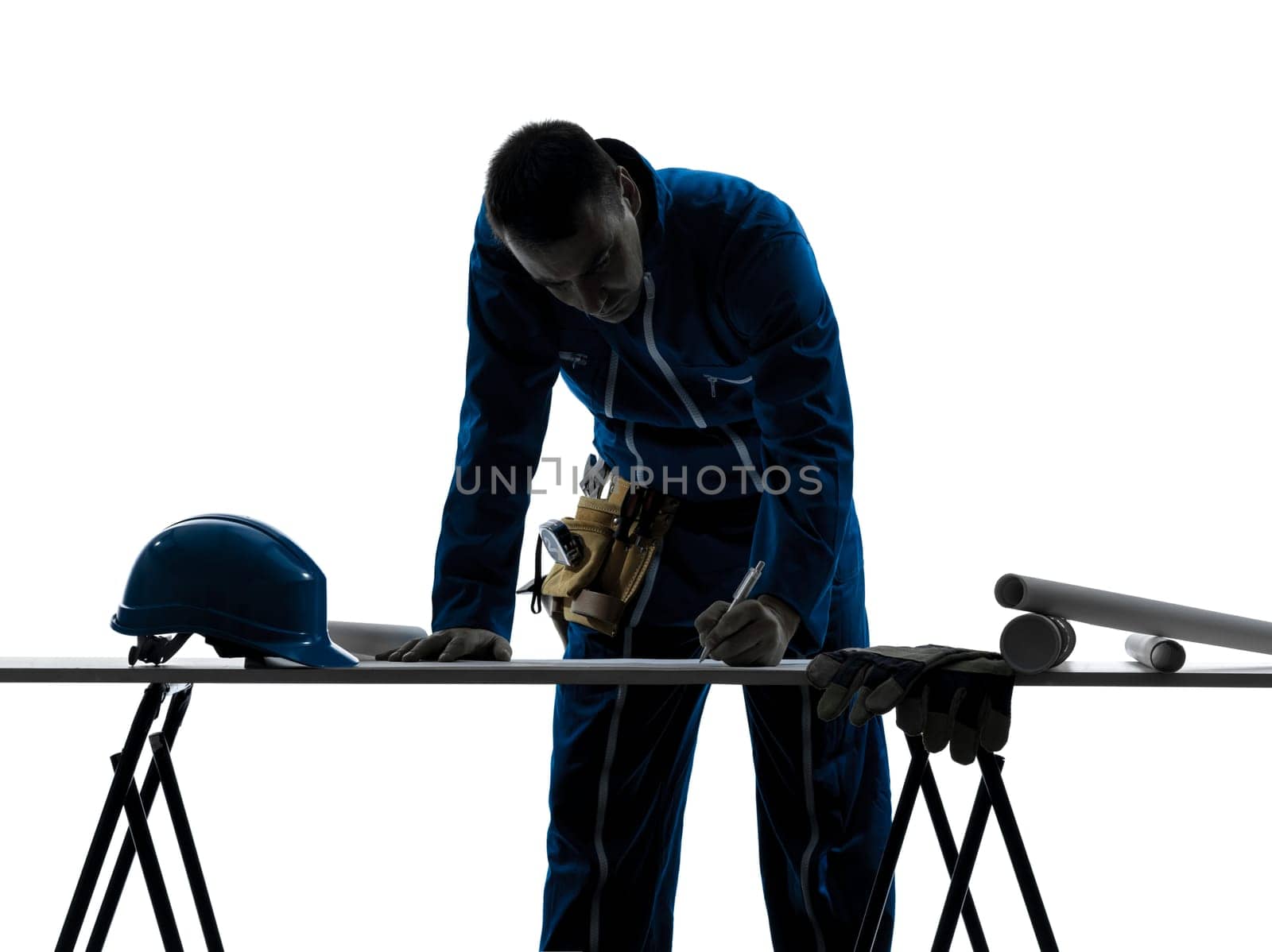 one caucasian man construction worker pointing showing silhouette portrait in studio on white background