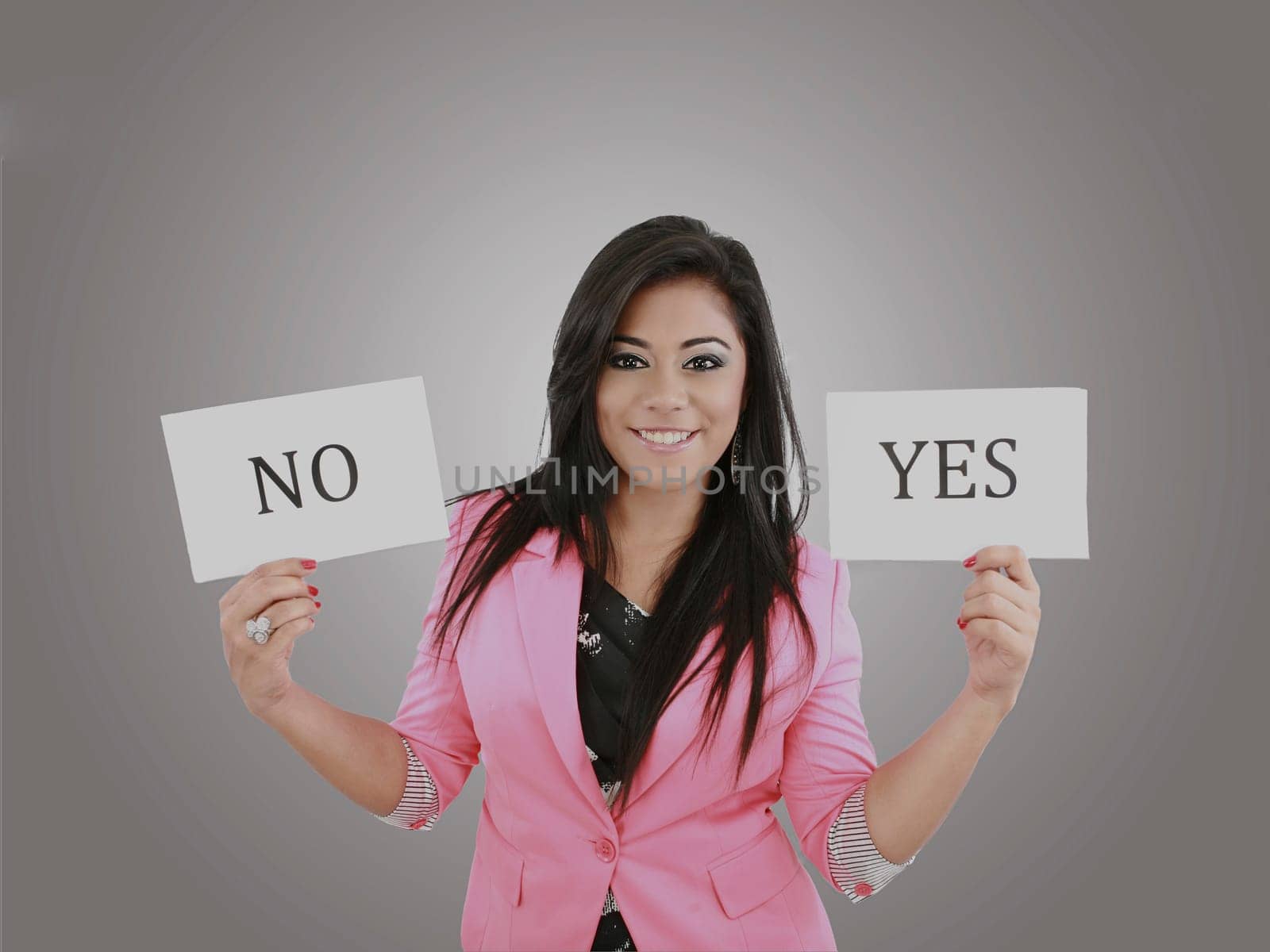 Business young woman trying to make a decision between Yes or No choice