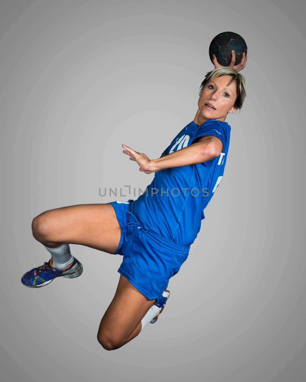 Handball player in jump throw