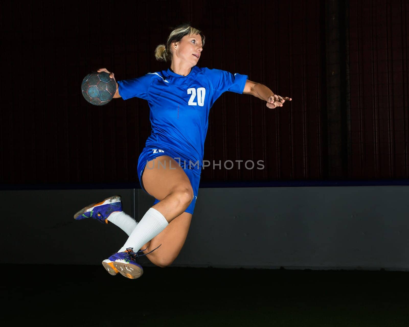 Handball player in jump throw