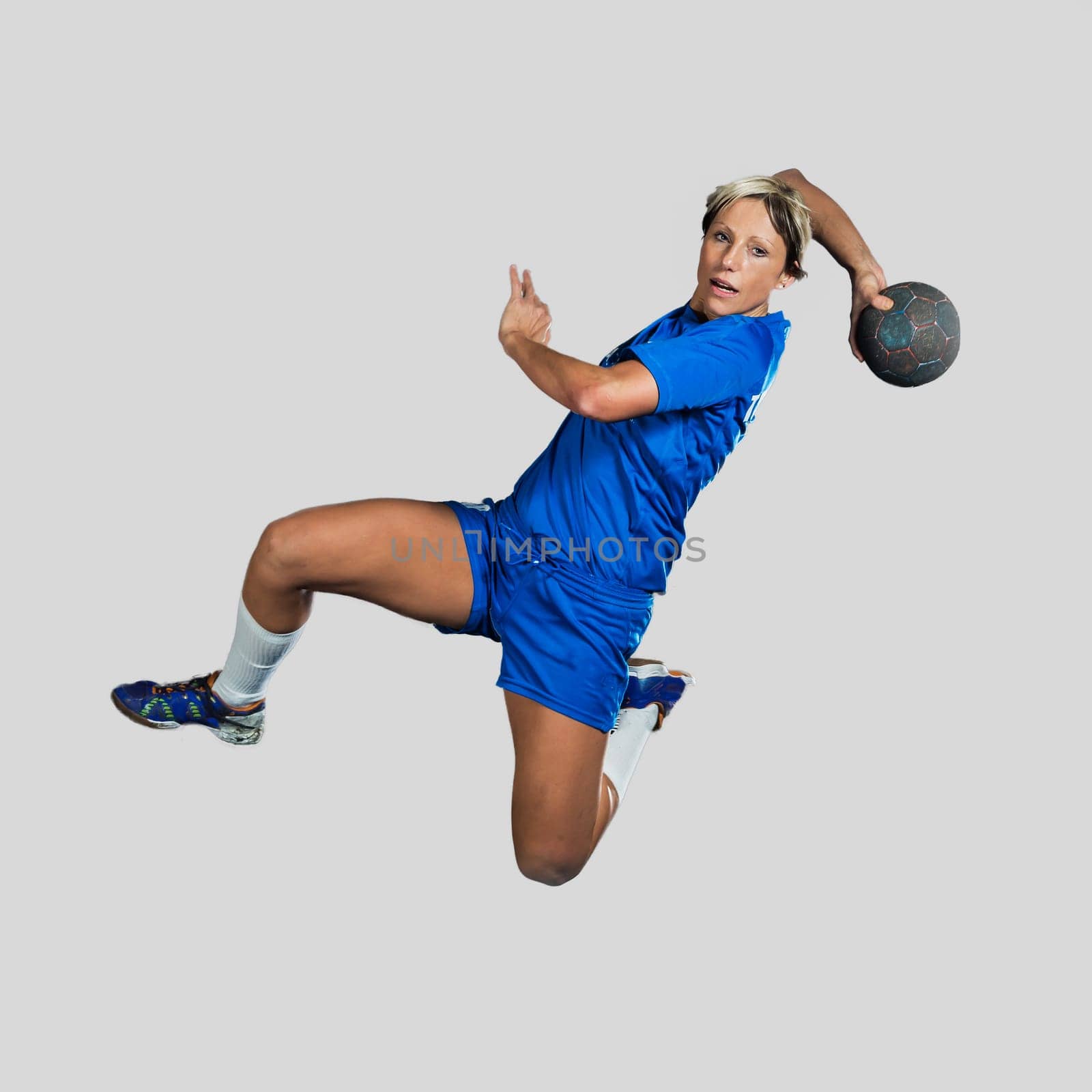 Handball player in jump throw