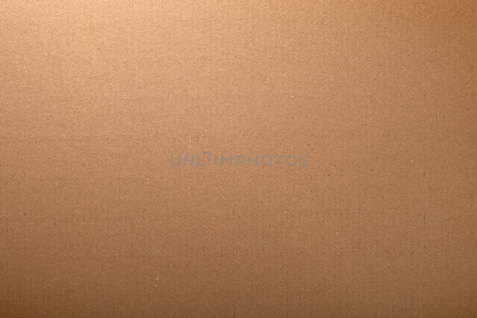 Brown cardboard carton texture for background. Top view