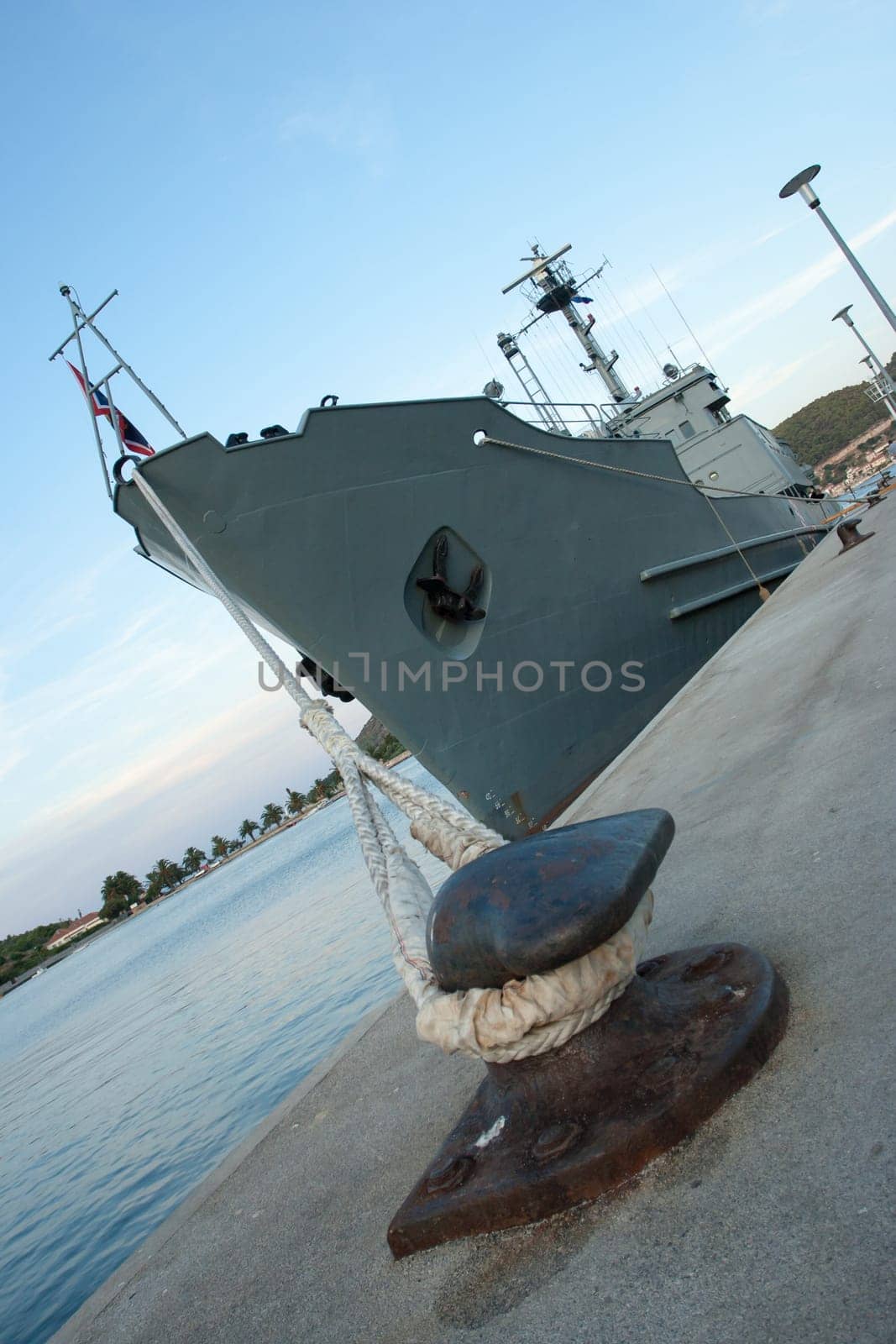 steel bollard with strong ship rope of a military ship