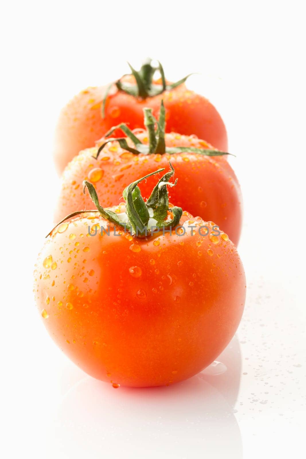 three tomatoes