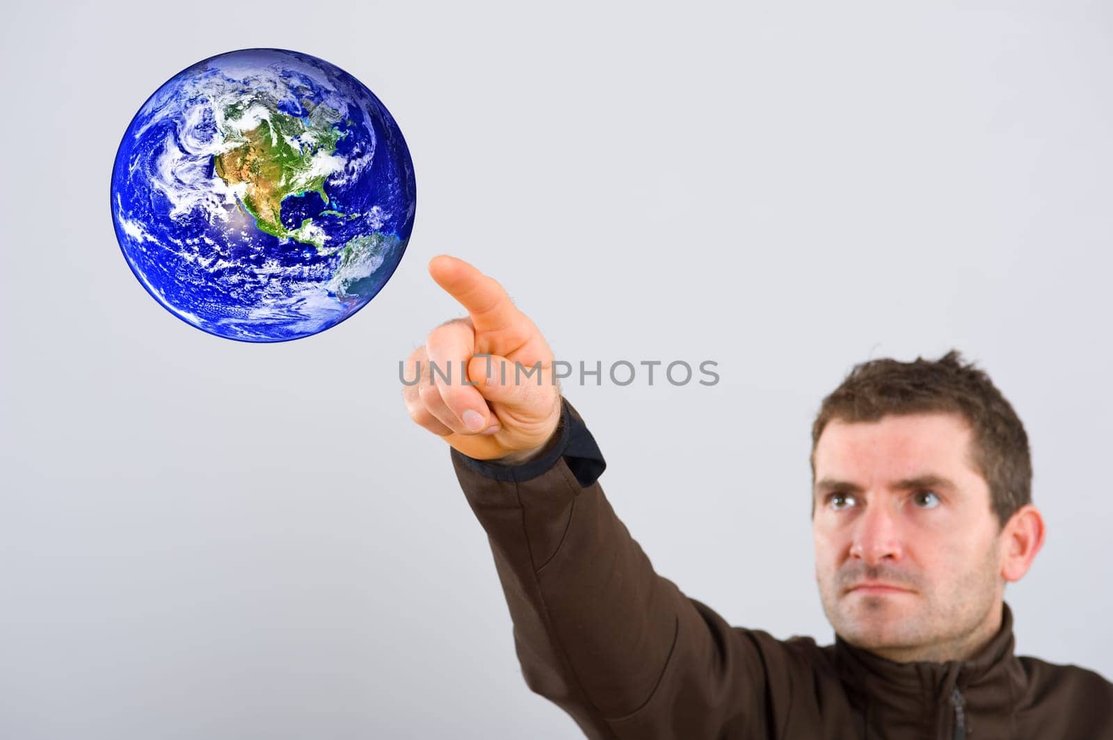 man is touching the world