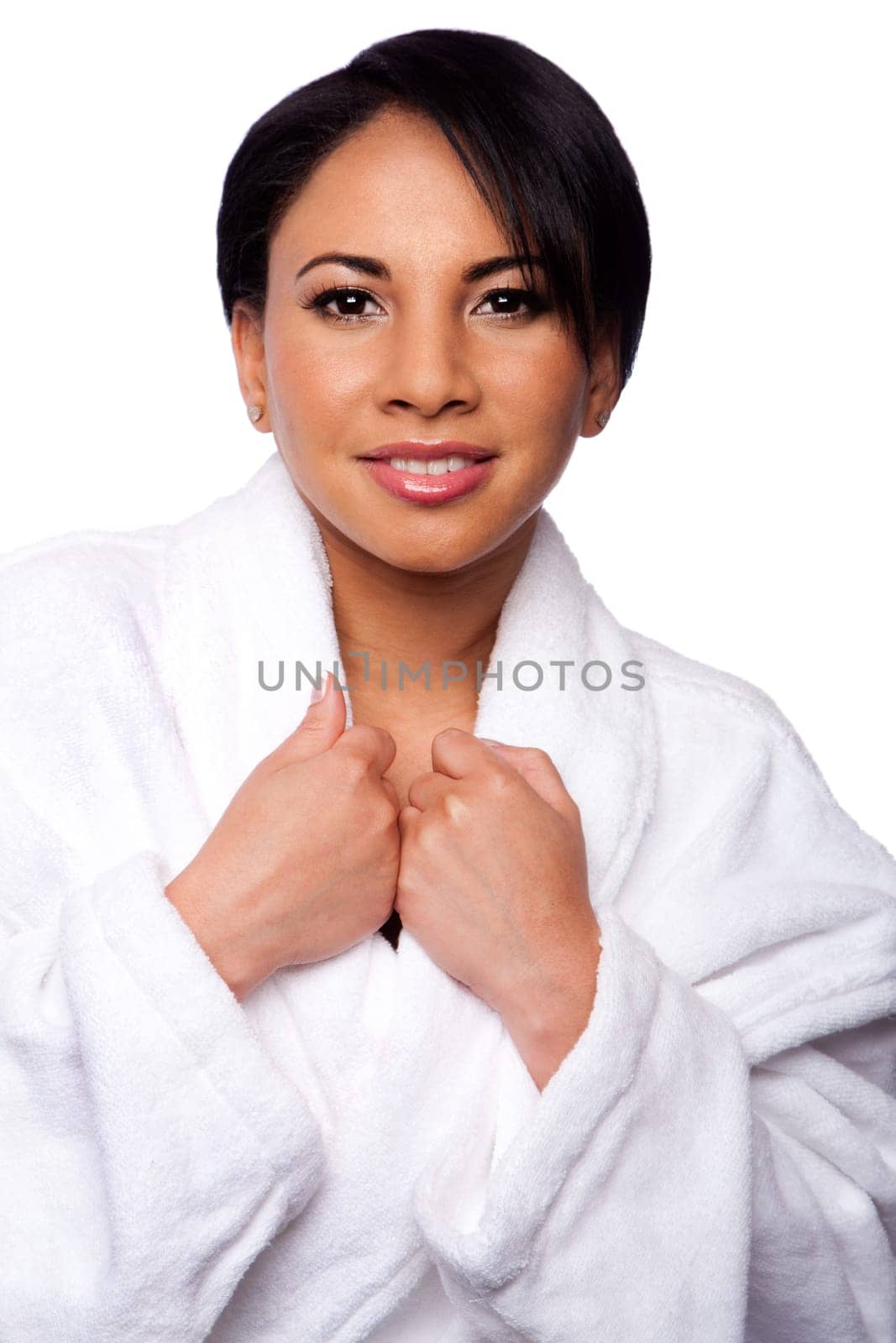 Beautiful happy woman in white bathrobe at spa massage parlor after holiday healthy skincare beauty treatment, isolated.