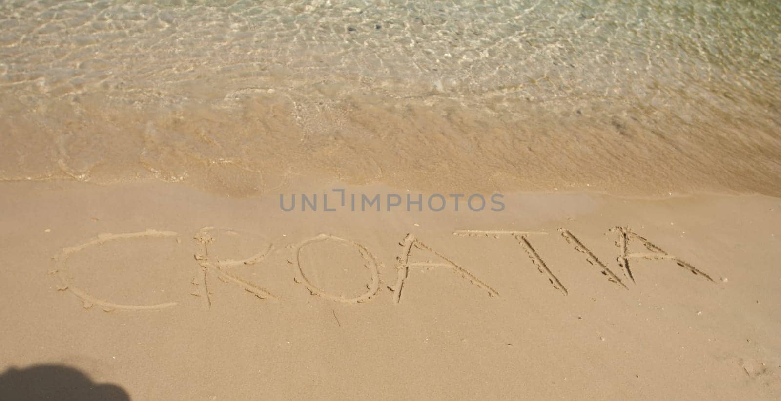 Croatia word in the sand at the beach