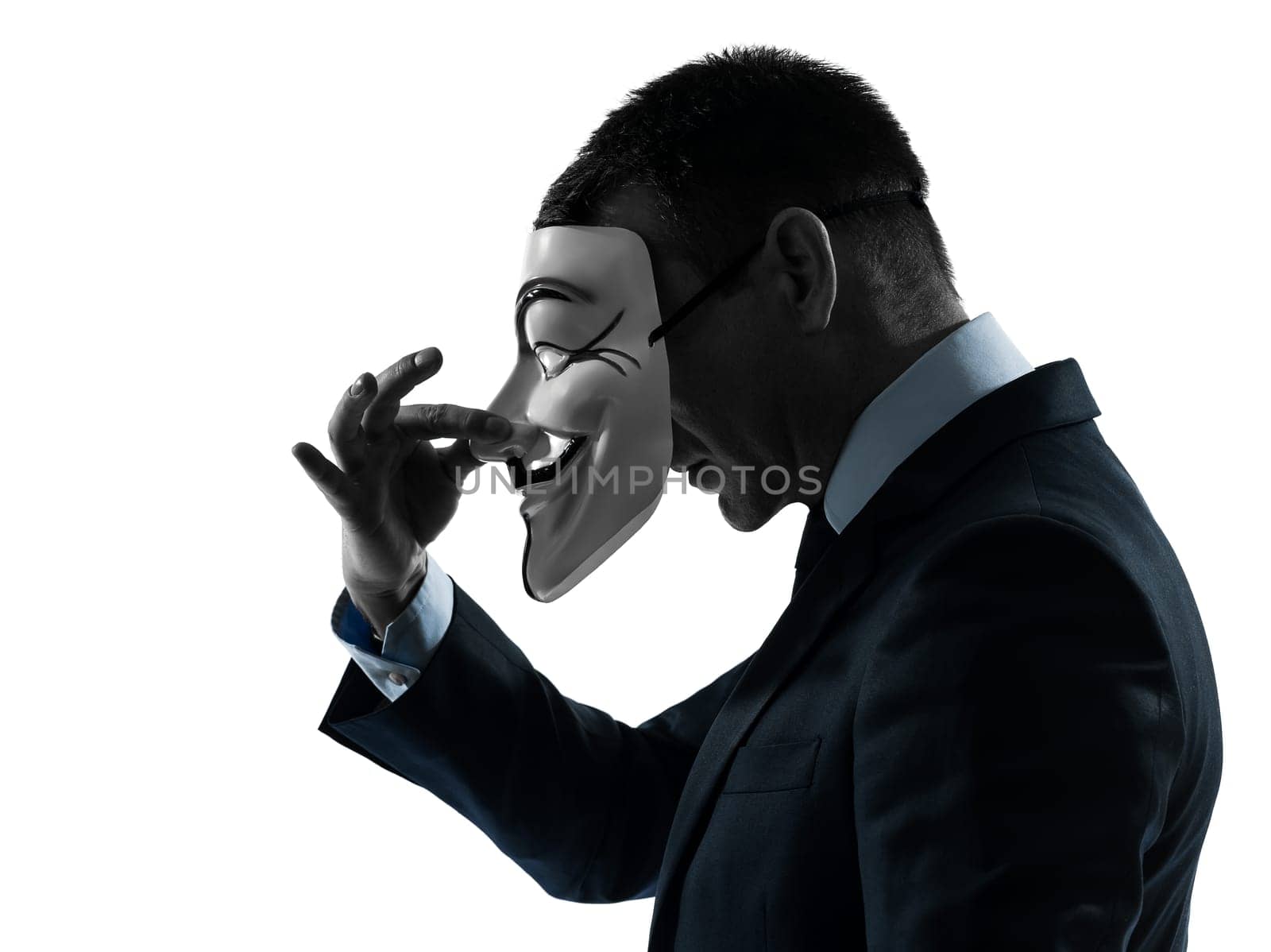 PARIS– OCTOBER 30 : one man dressed and masked as a  member of Anonymous underground group on October 30, 2012 in Paris ,France