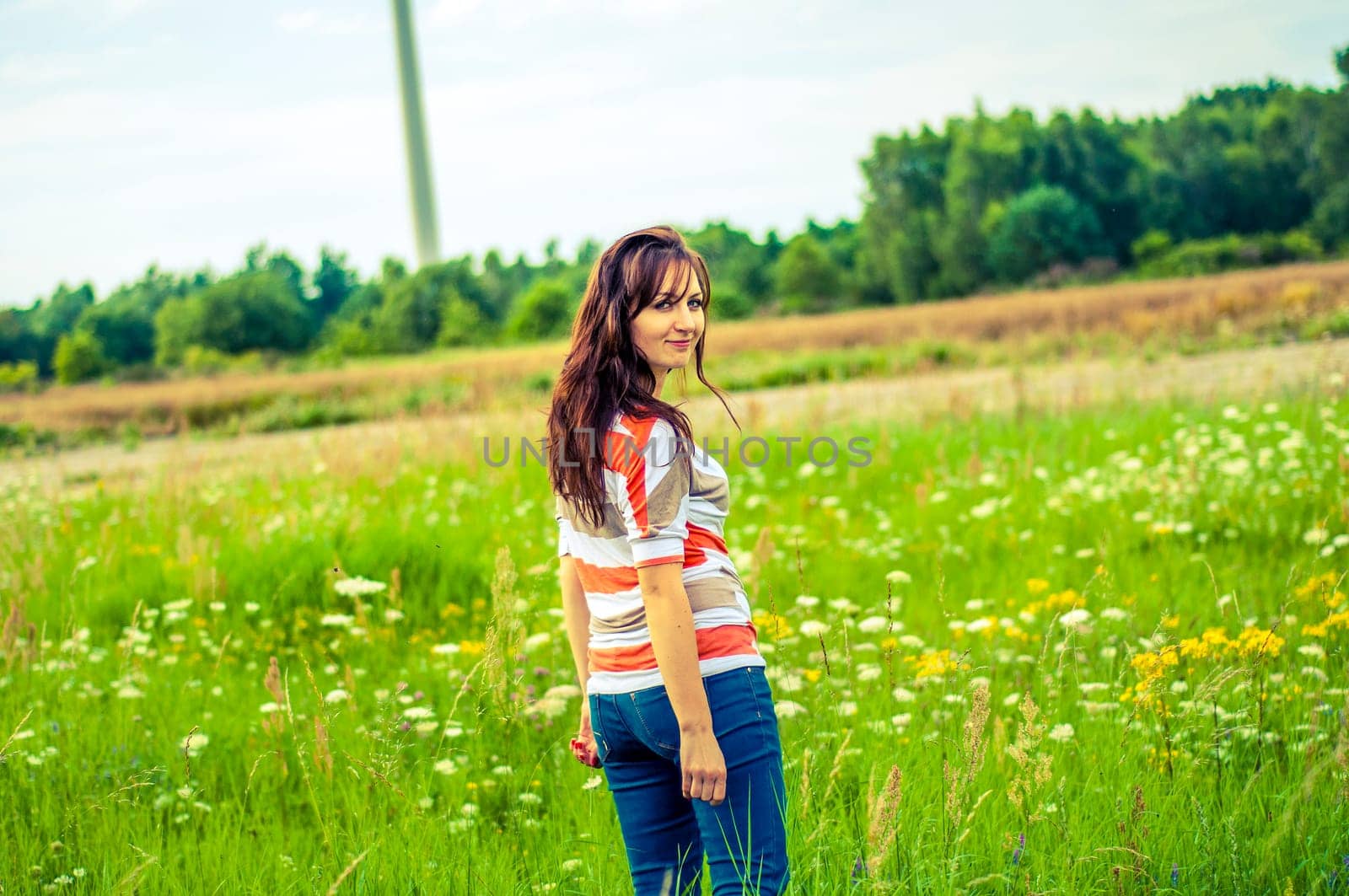 Outdoors portrait of beautiful young brunette girl
