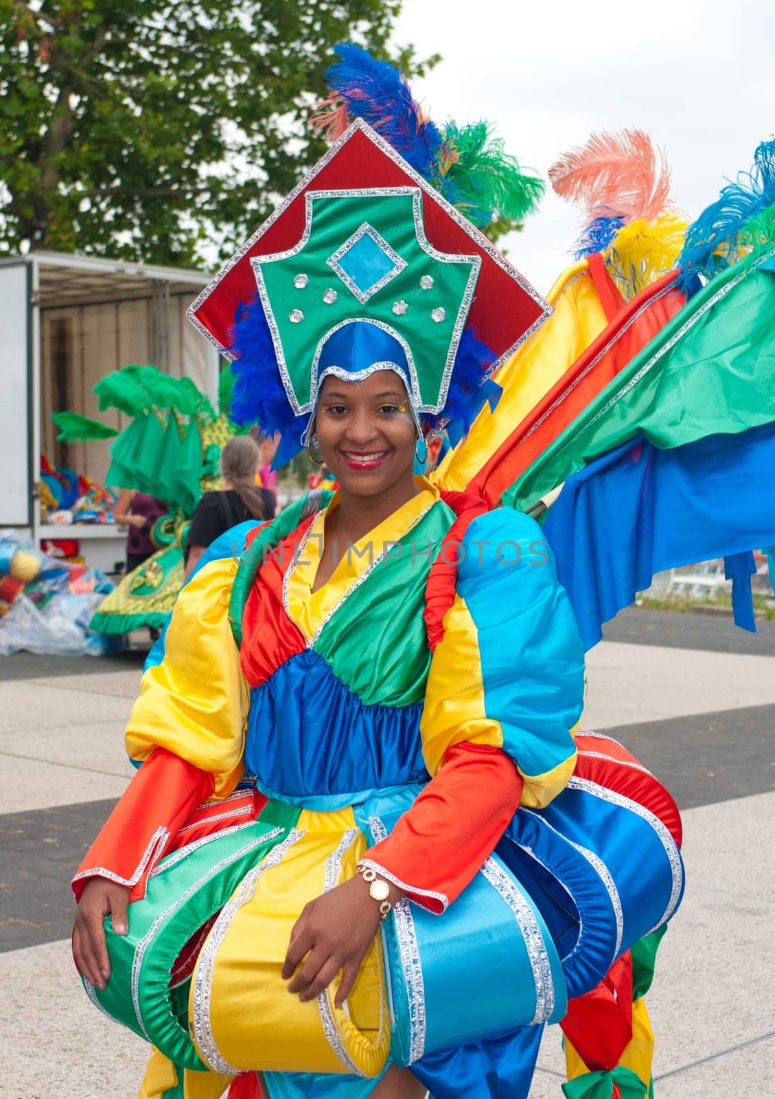 colorful dressed woman during the 8th salsa and samba festival in Nijmegen, Netherlands. The whole weekend hundreds of dancers and artists are entertaining the people