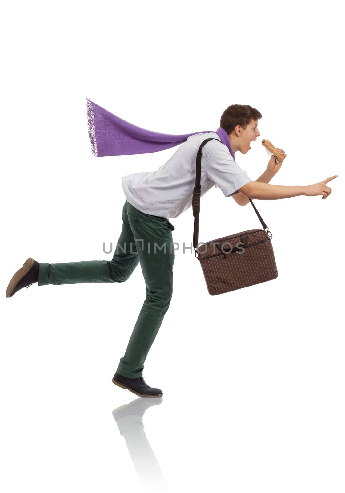 Young businessman running in a hurry