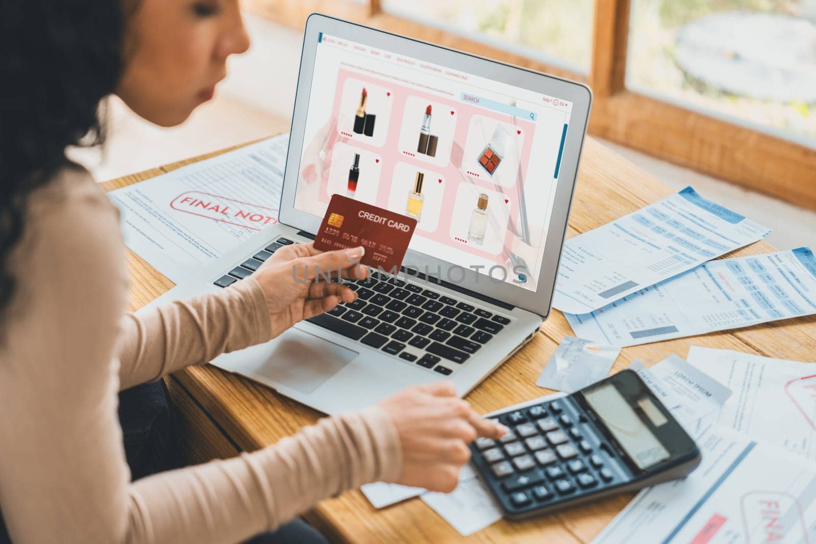 Woman shopping online on internet marketplace browsing for sale items for modern lifestyle and use credit card for online payment from wallet protected by crucial cyber security software