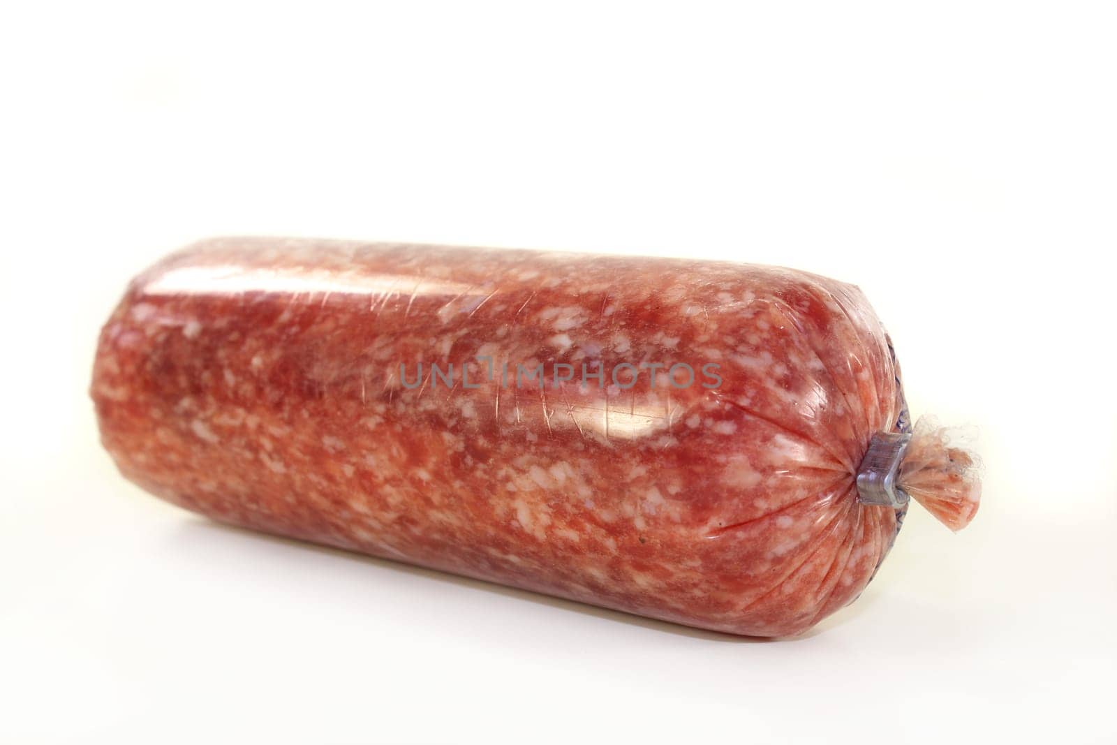 an onion sausage against a white background