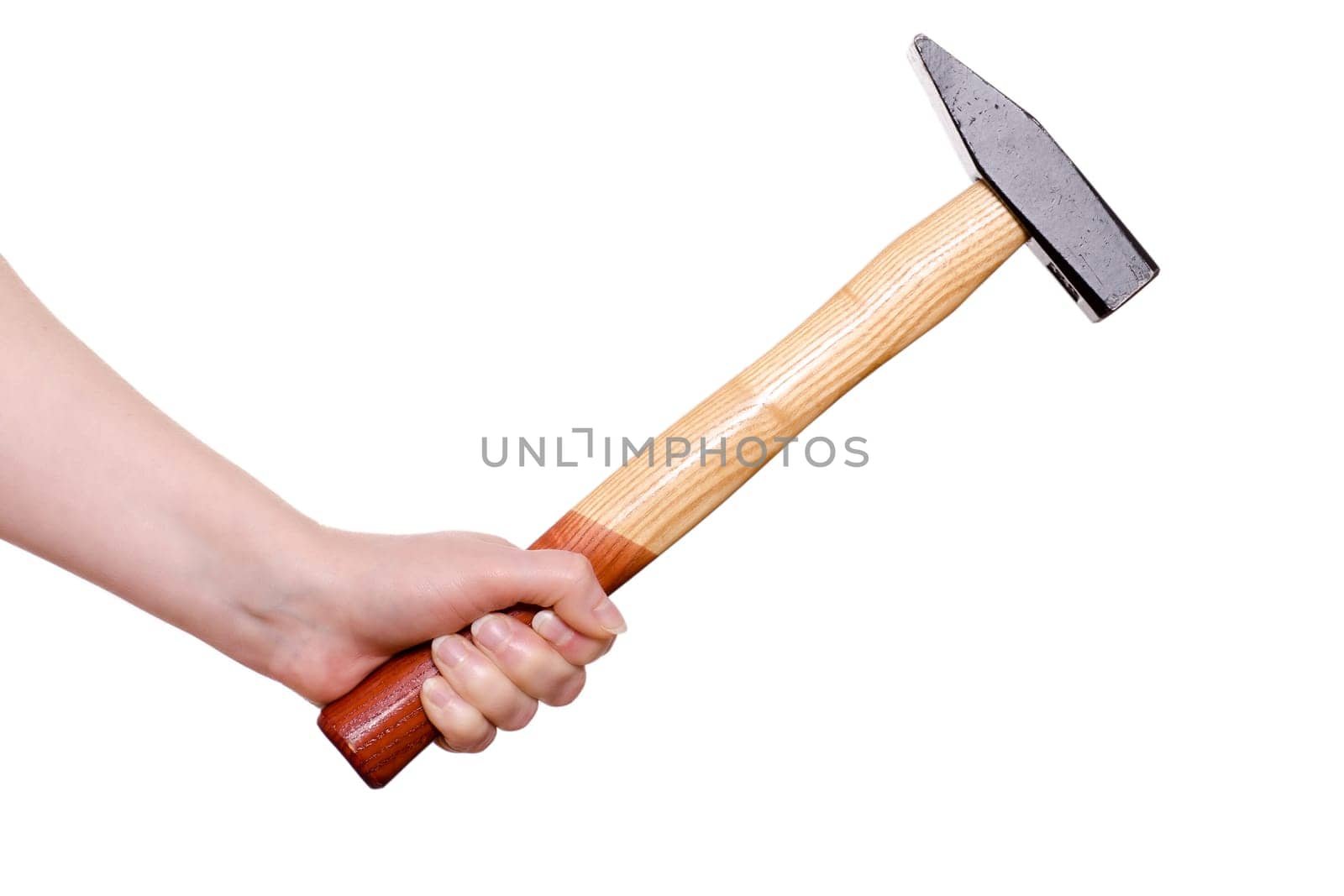 Hand holding a hammer against white background