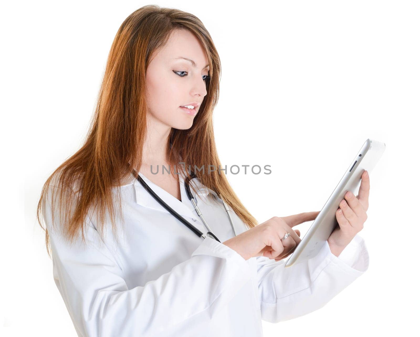 Pretty female student doctor working with an digital tablet