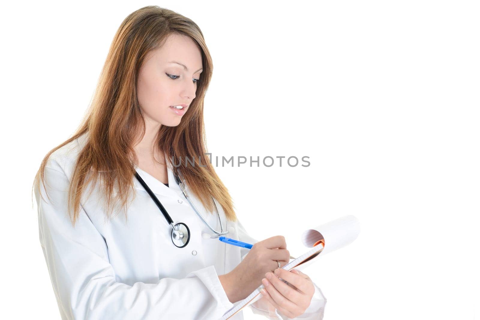 Pretty female doctor isolated writing notes