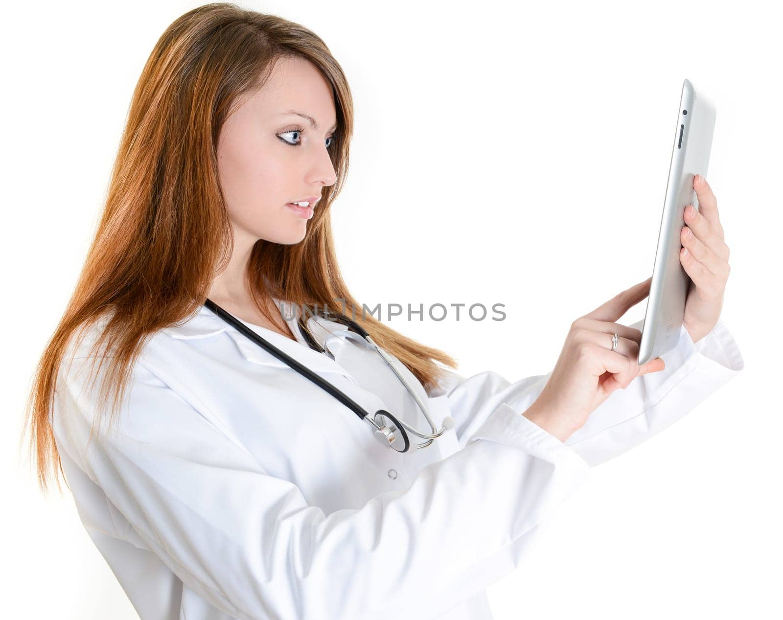 Pretty female student doctor working with an digital tablet