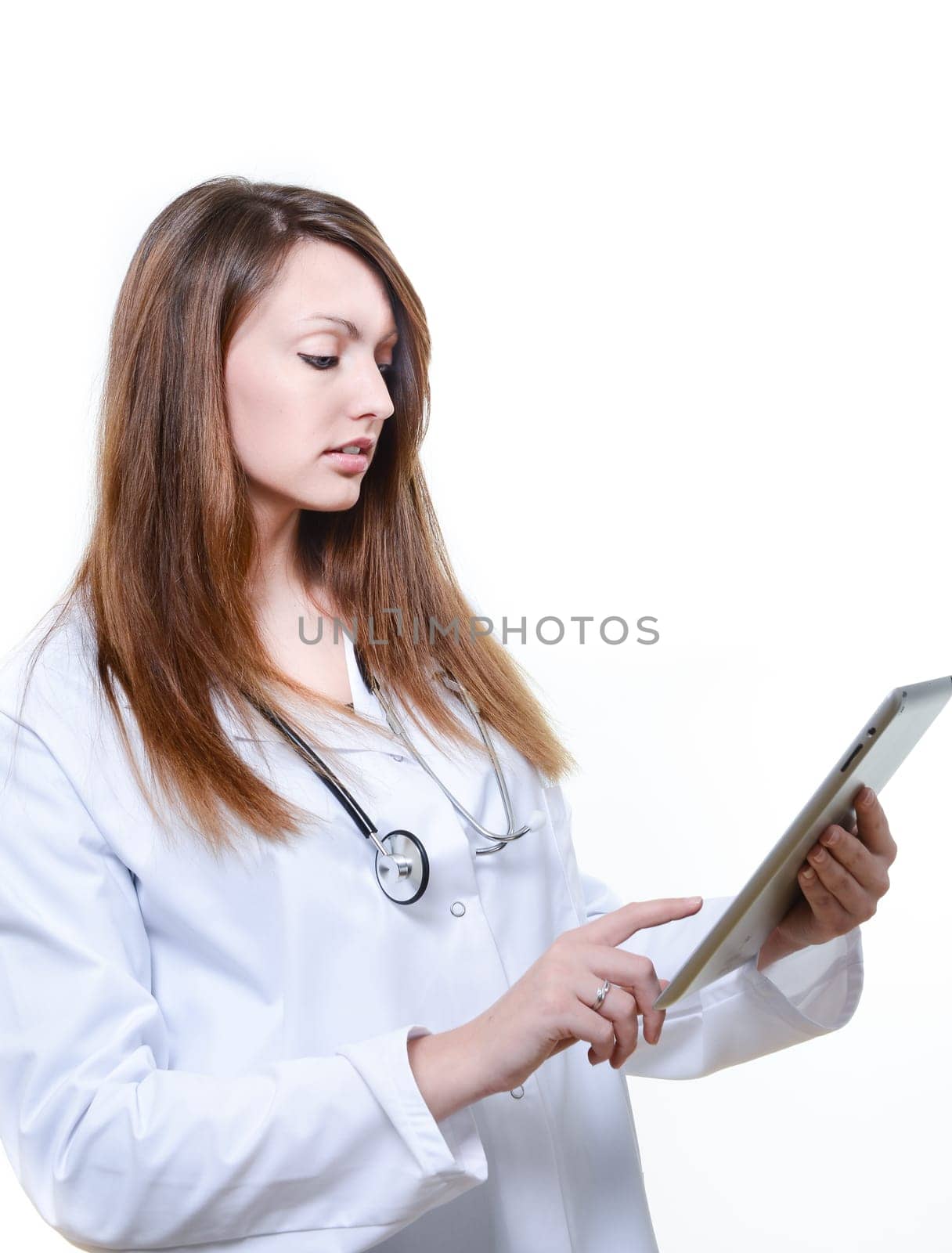 Pretty female student doctor working with an digital tablet