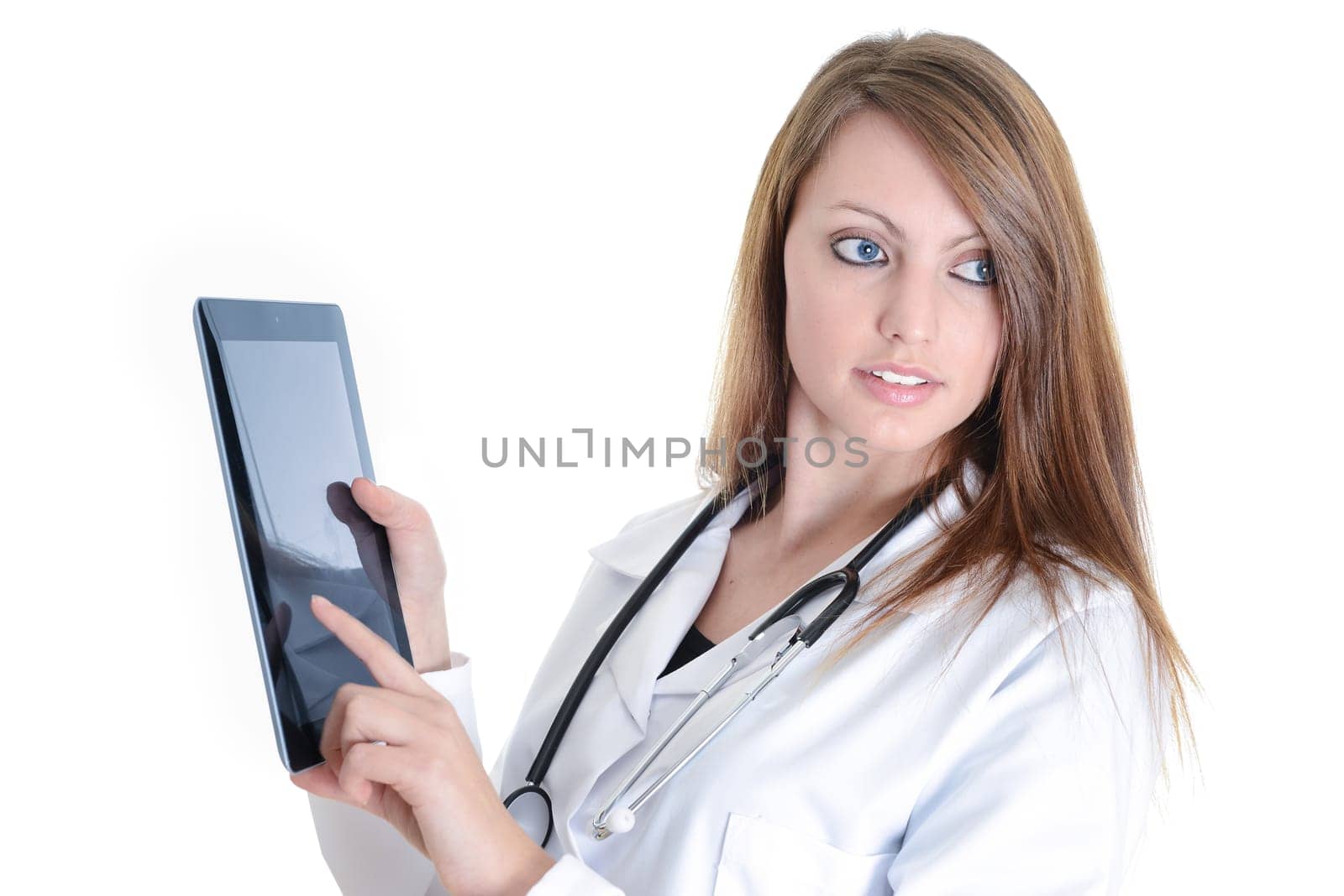 Pretty female student doctor working with an digital tablet