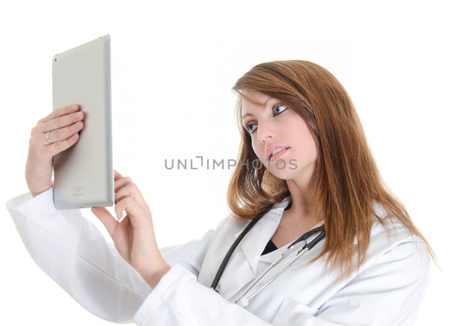 Pretty female student doctor working with an digital tablet