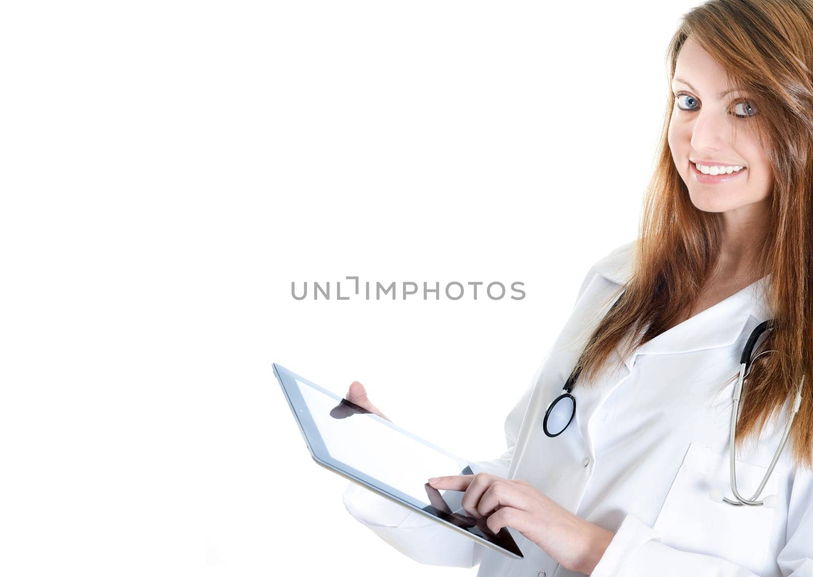 Pretty female student doctor working with an digital tablet
