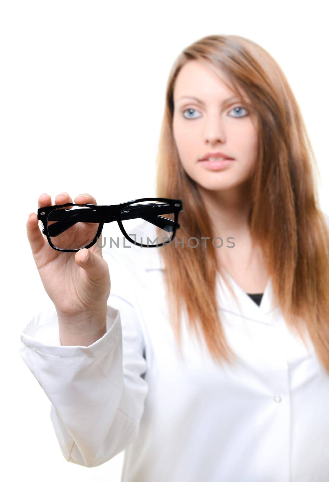 Woman with glasses and snellen eye chart in background