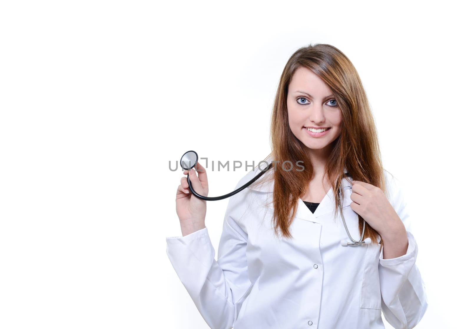 Pretty female doctor isolated over a white background