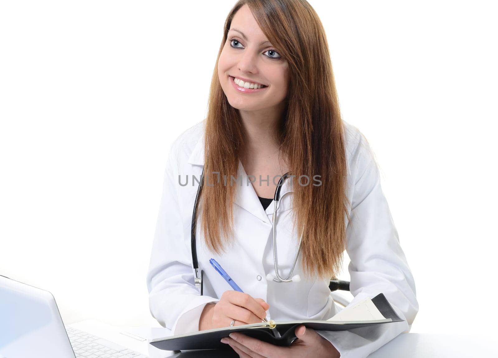 Pretty female doctor isolated writing in a Planner