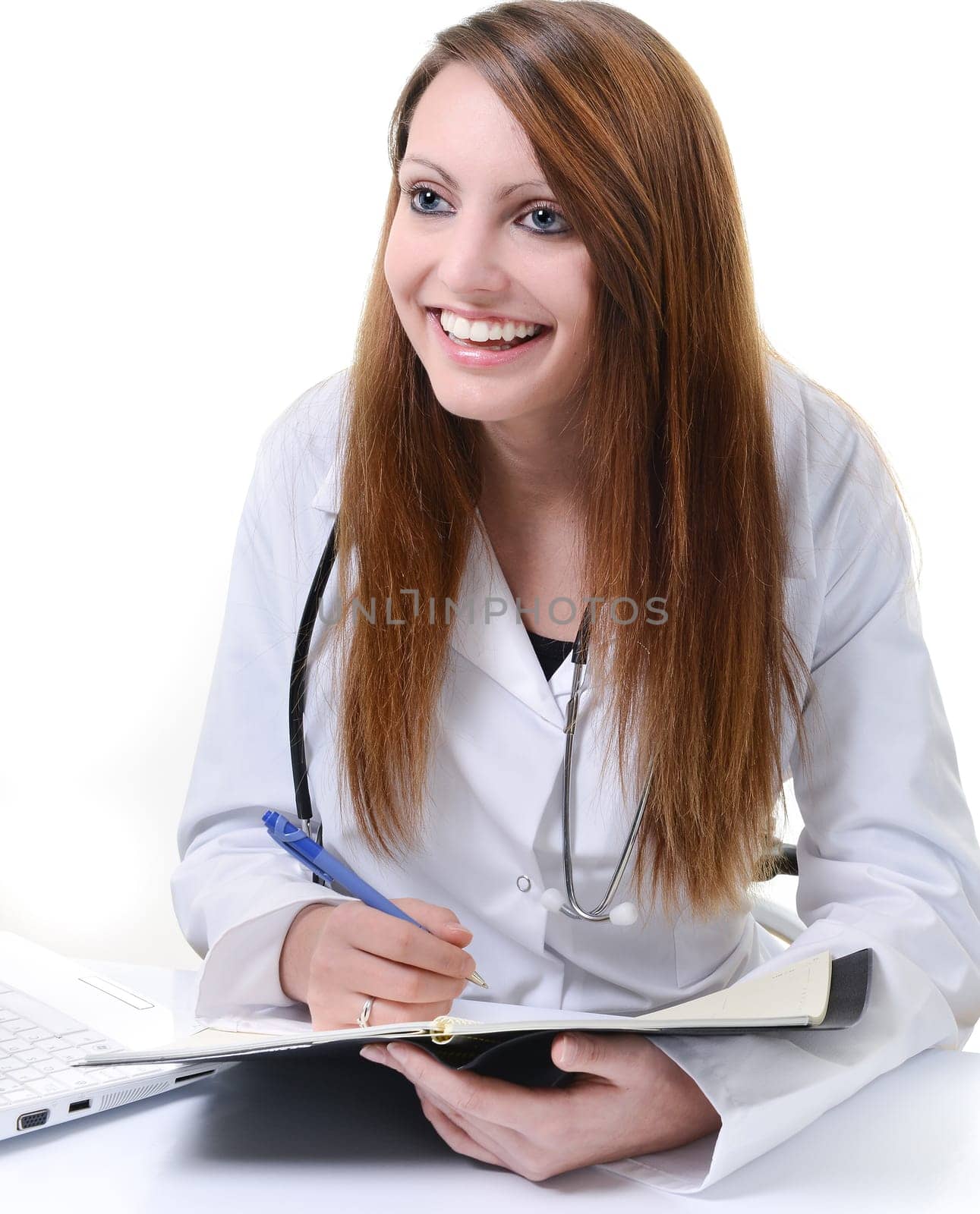 Pretty female doctor isolated writing in a Planner