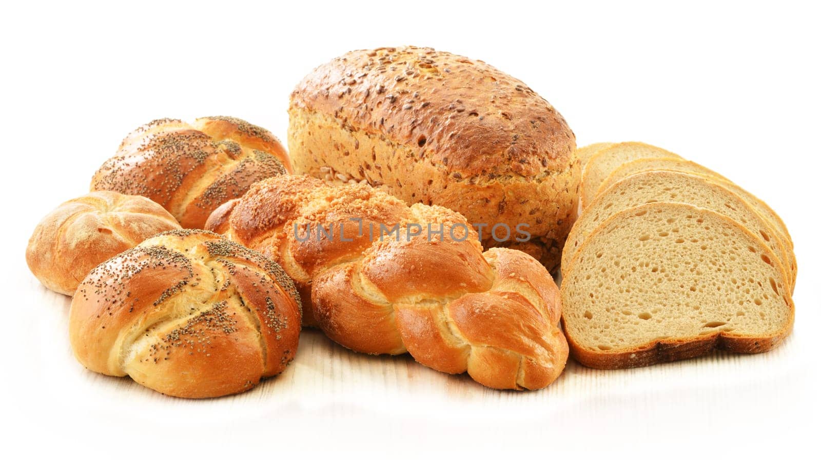Composition with bread and rolls isolated on white