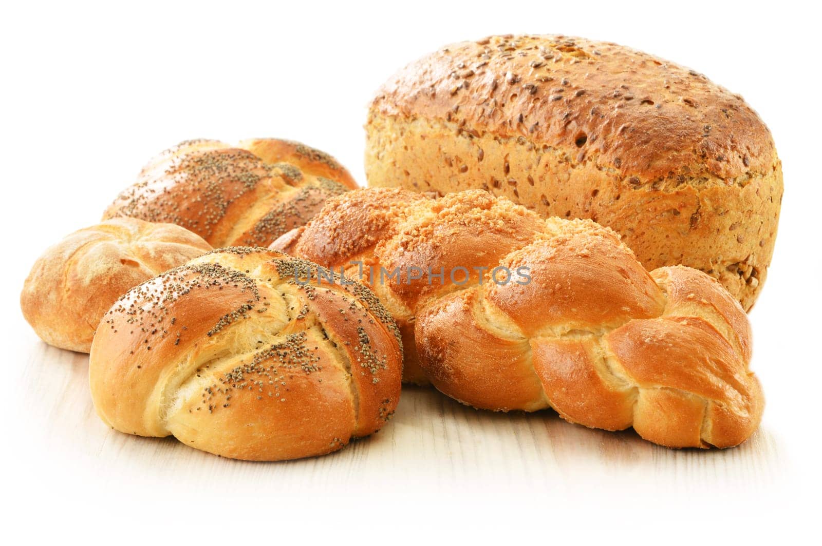 Composition with bread and rolls isolated on white