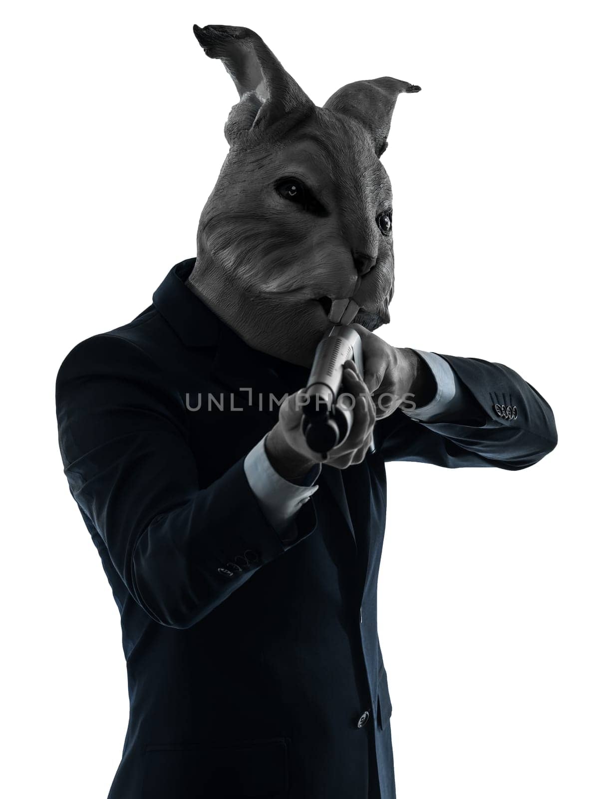 one caucasian man rabbit mask hunting with shotgun portrait in silhouette studio isolated on white background