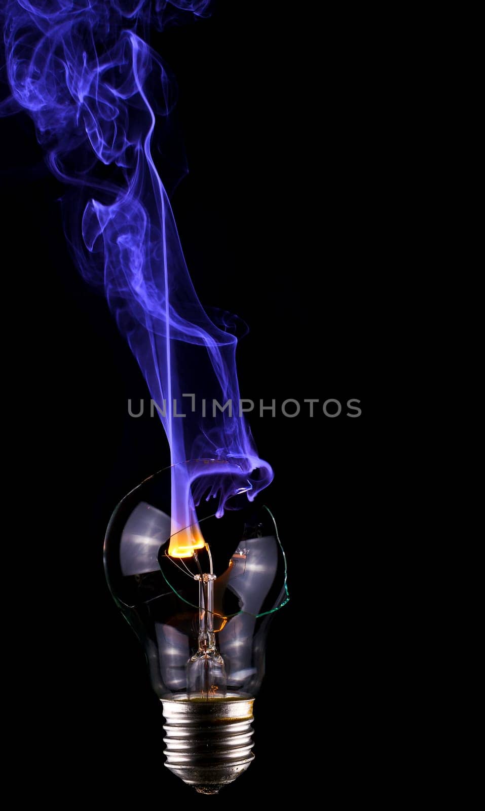 Light bulb with blue smoke