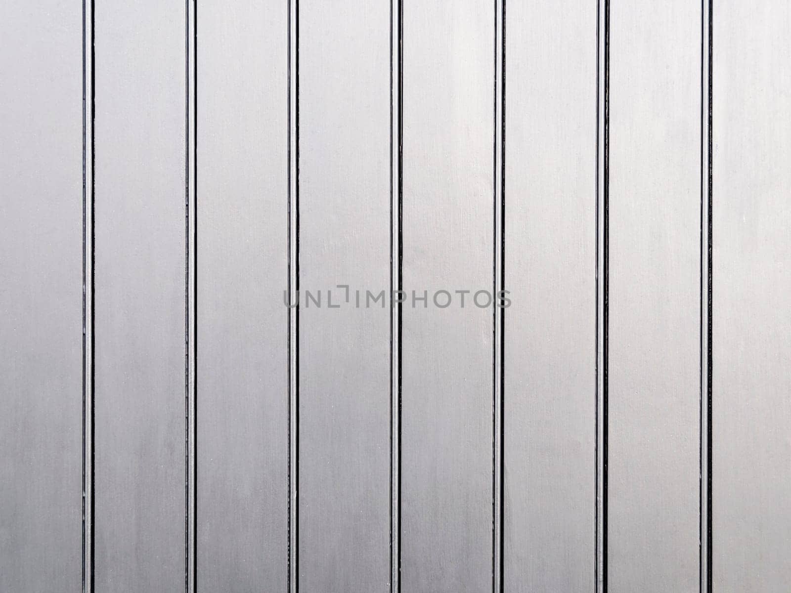 A silver painted wooden wall