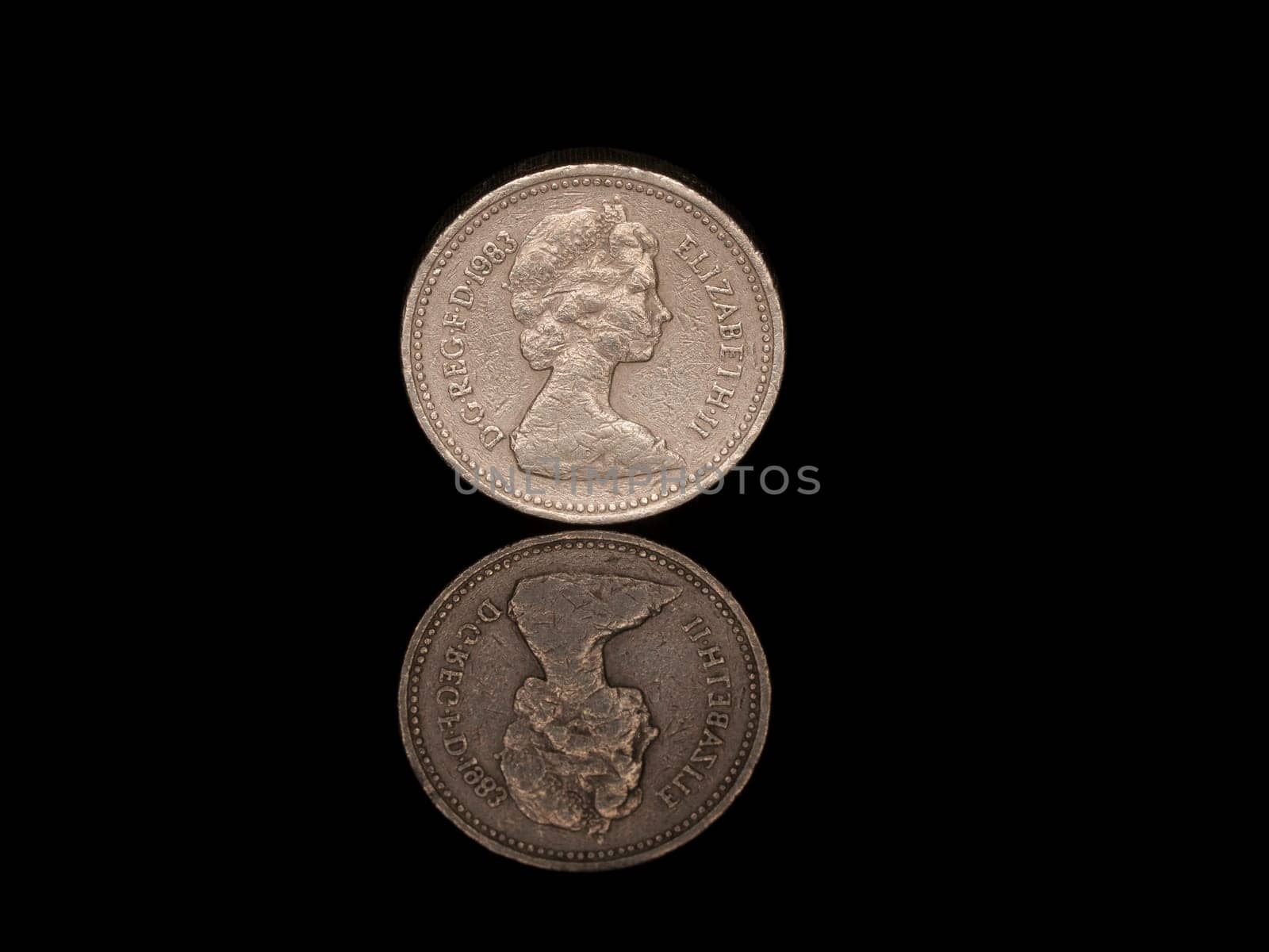 Reflected pound coin