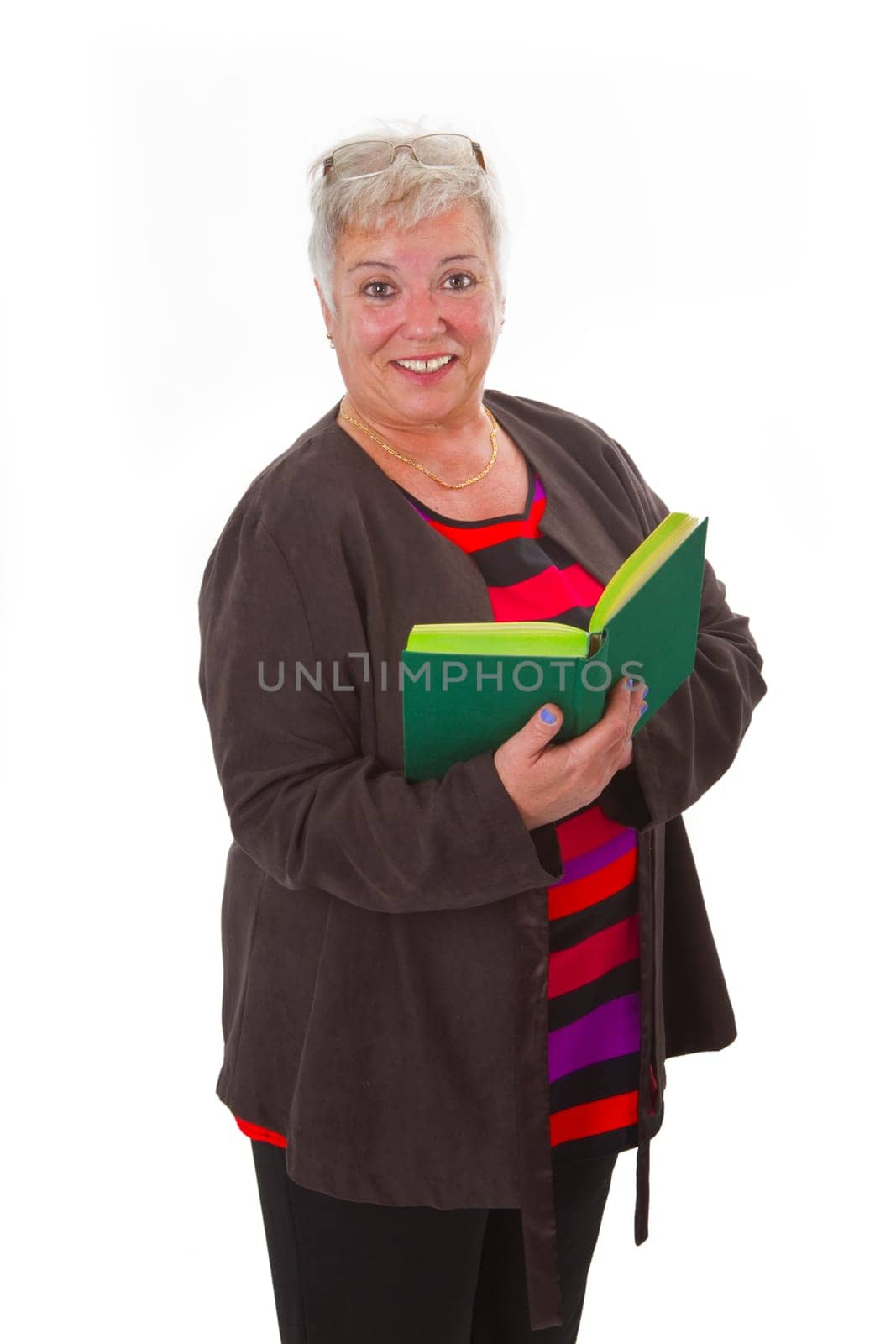 Senior woman reading a book - isolated on white background