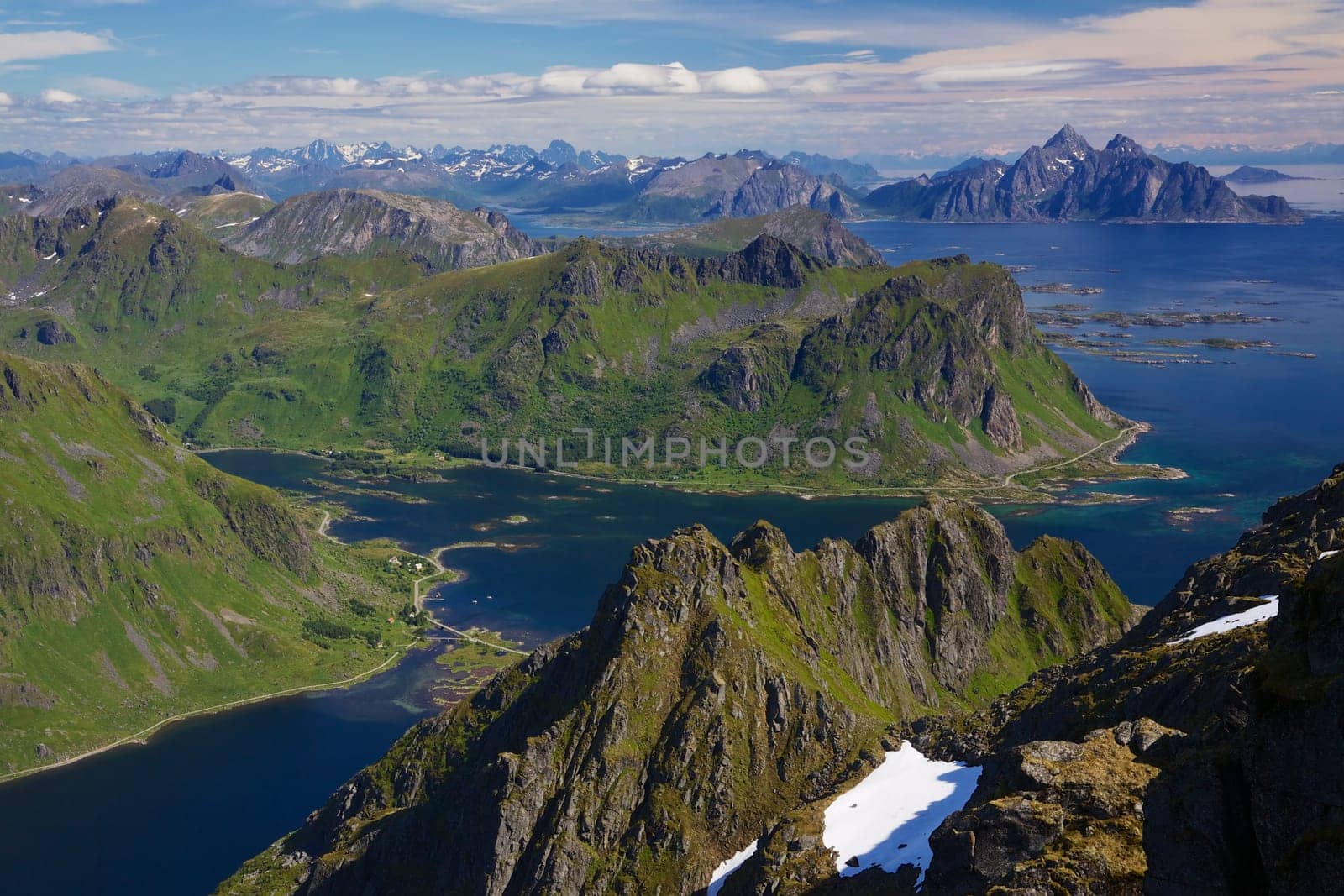 Scenic aerial view of sharp mountain peaks and deep fjords on Lofoten islands in Norway