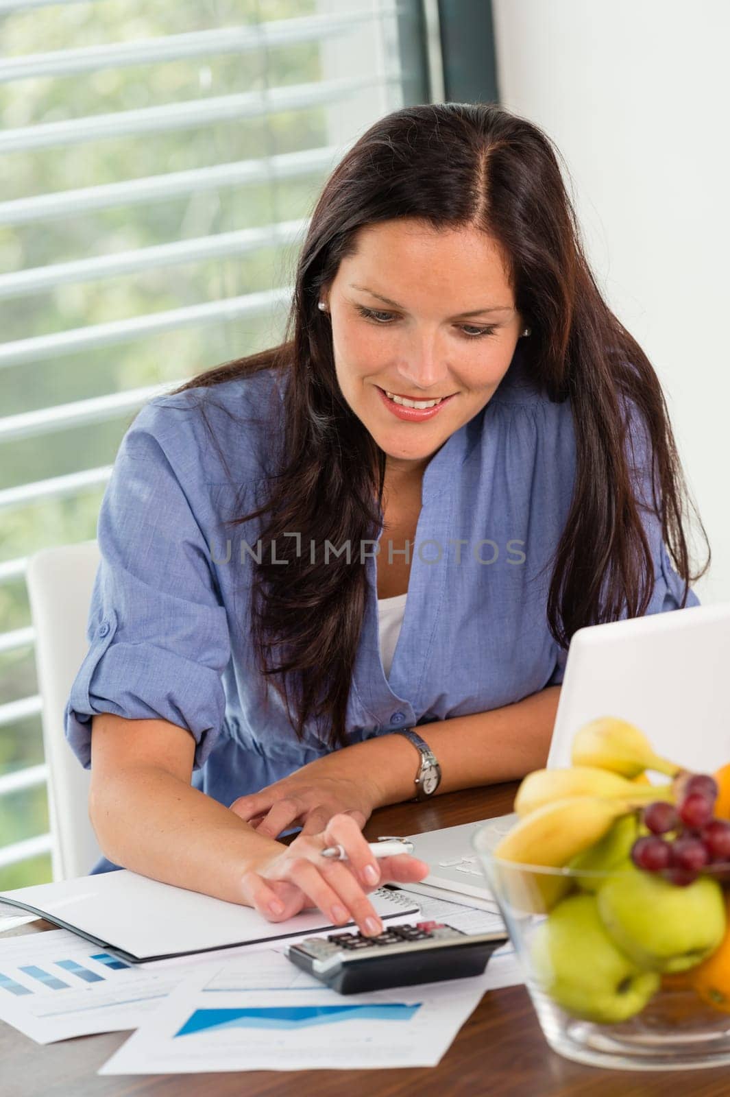 Happy woman student studying exam university library