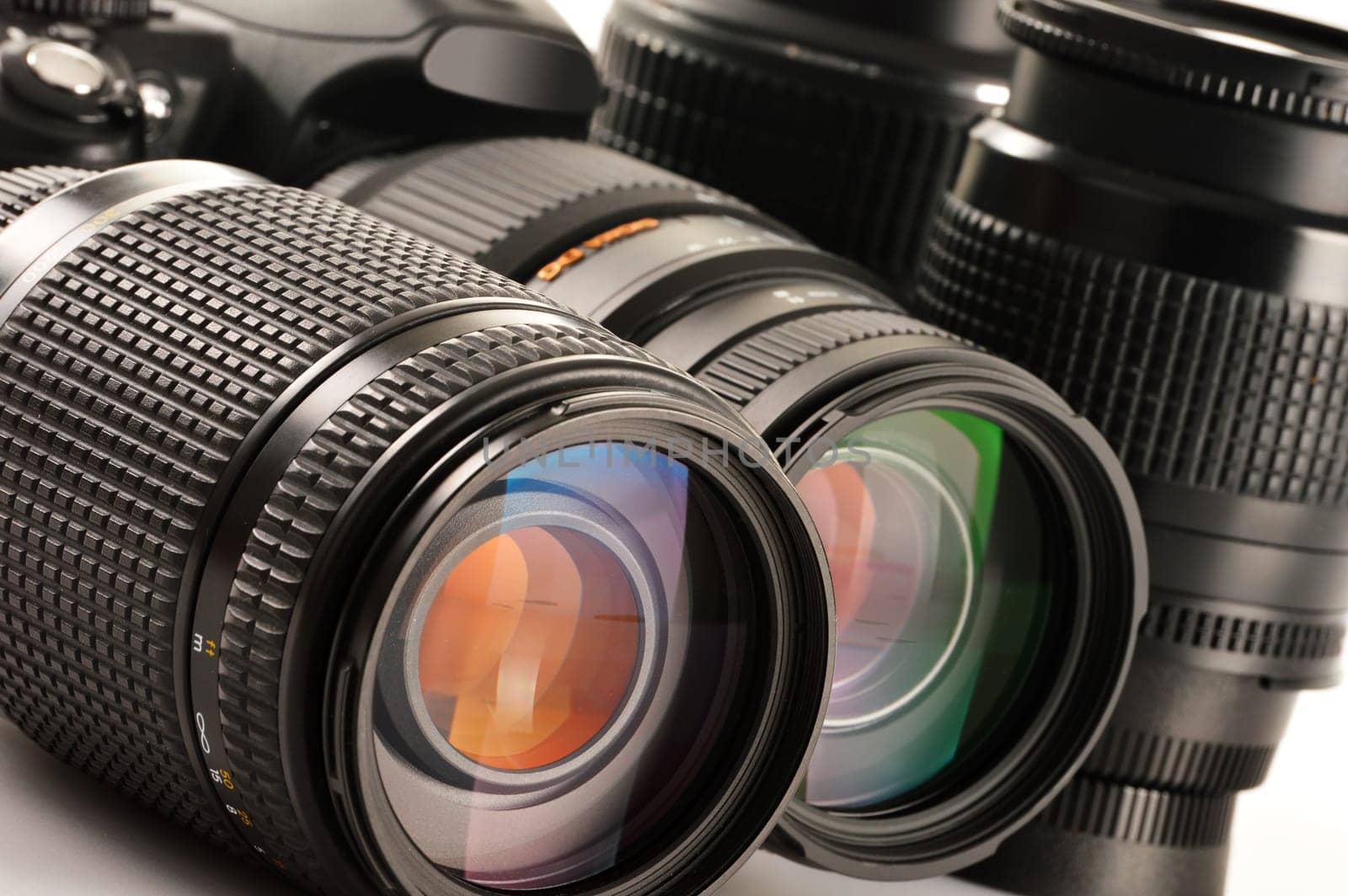 Composition with photo zoom lenses
