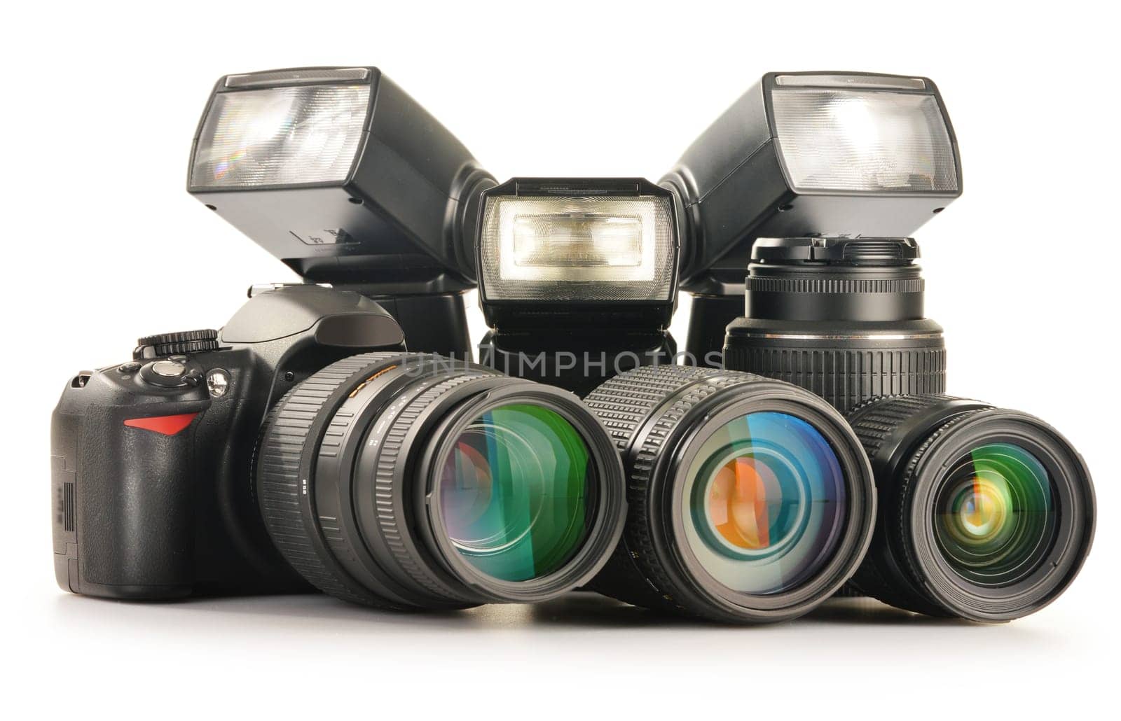 Composition with photo equipment including zoom lenses, camera and flash lights isolated on white