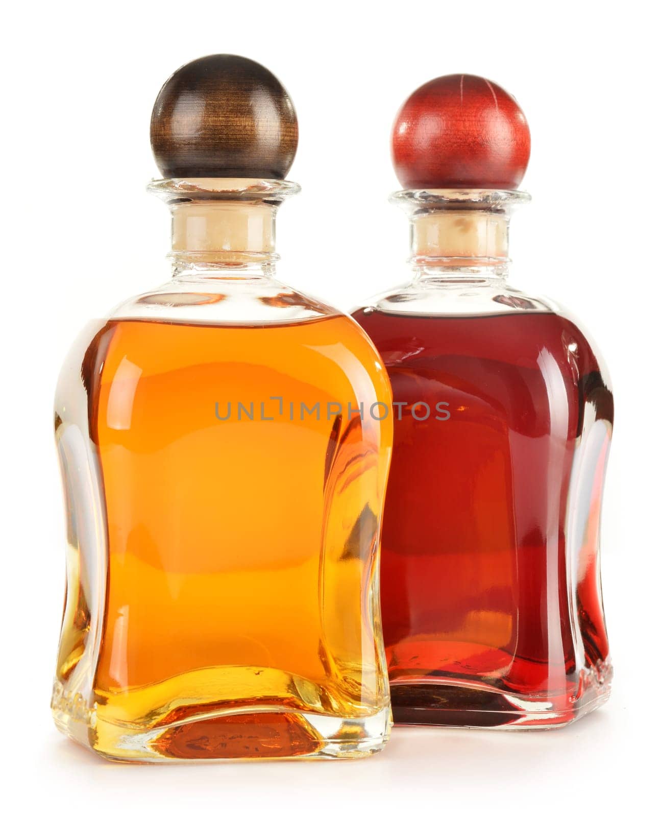 Composition with bottles of assorted alcoholic products isolated on white