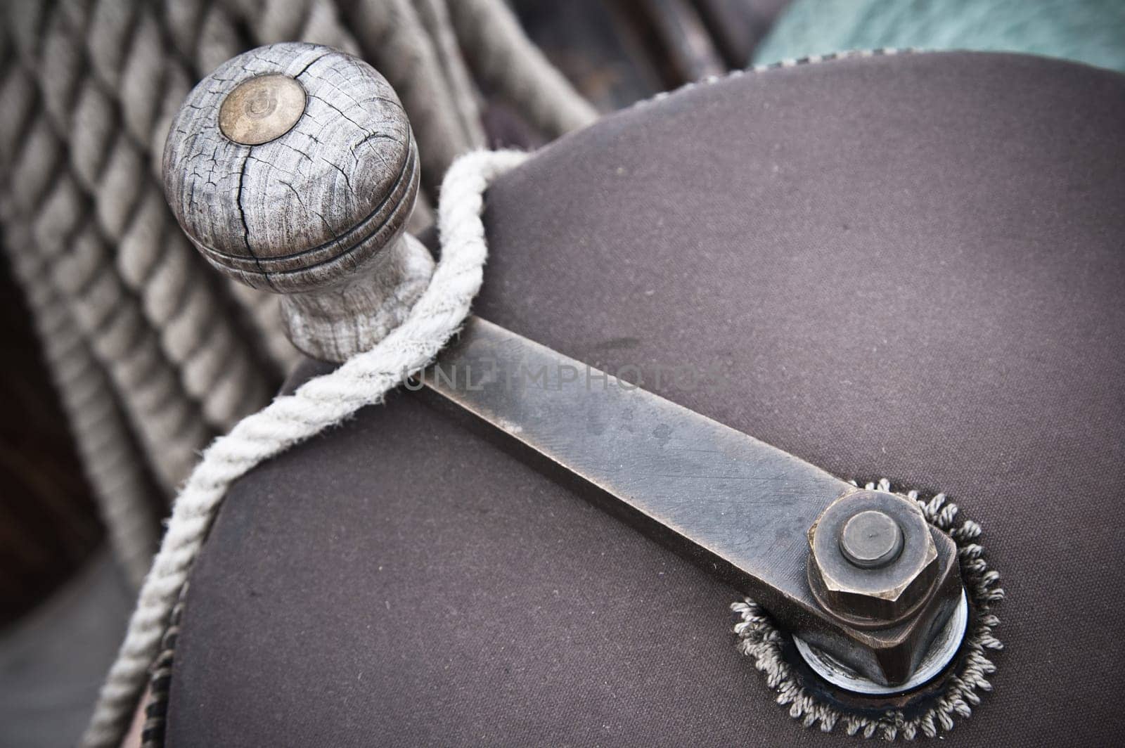 The handle of a drum for winding a rope,  on an ancient sailing vessel
