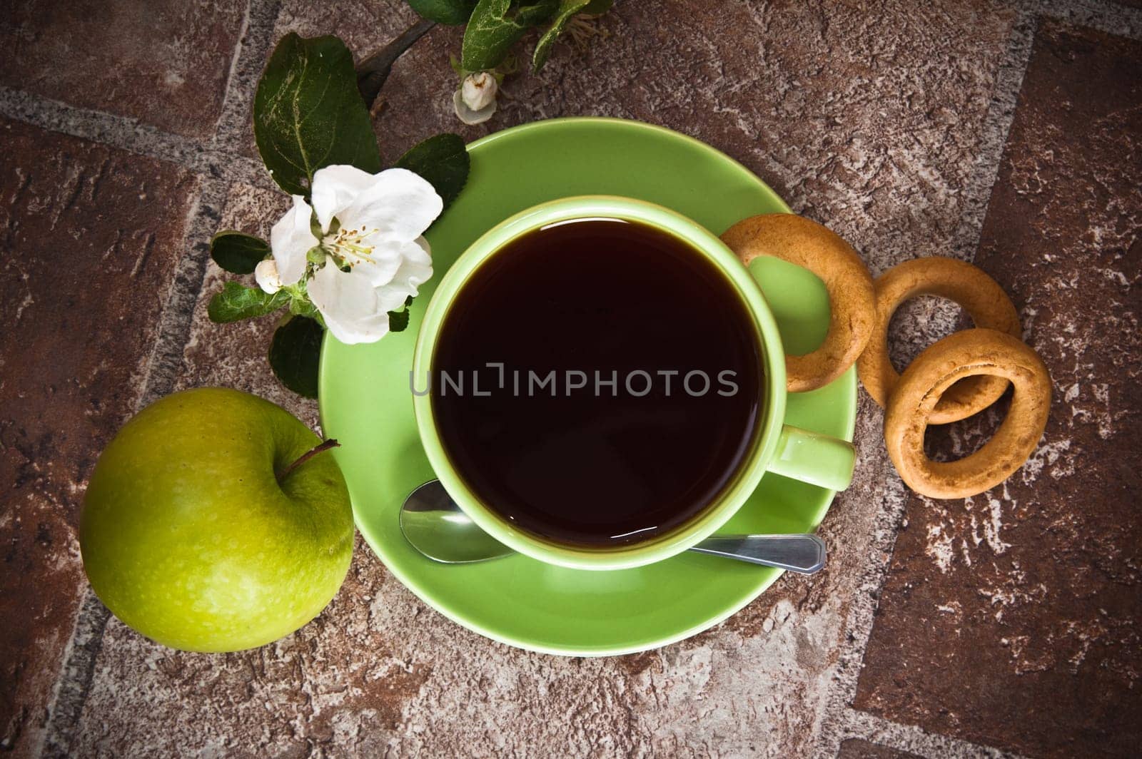 Cup of tea with an apple