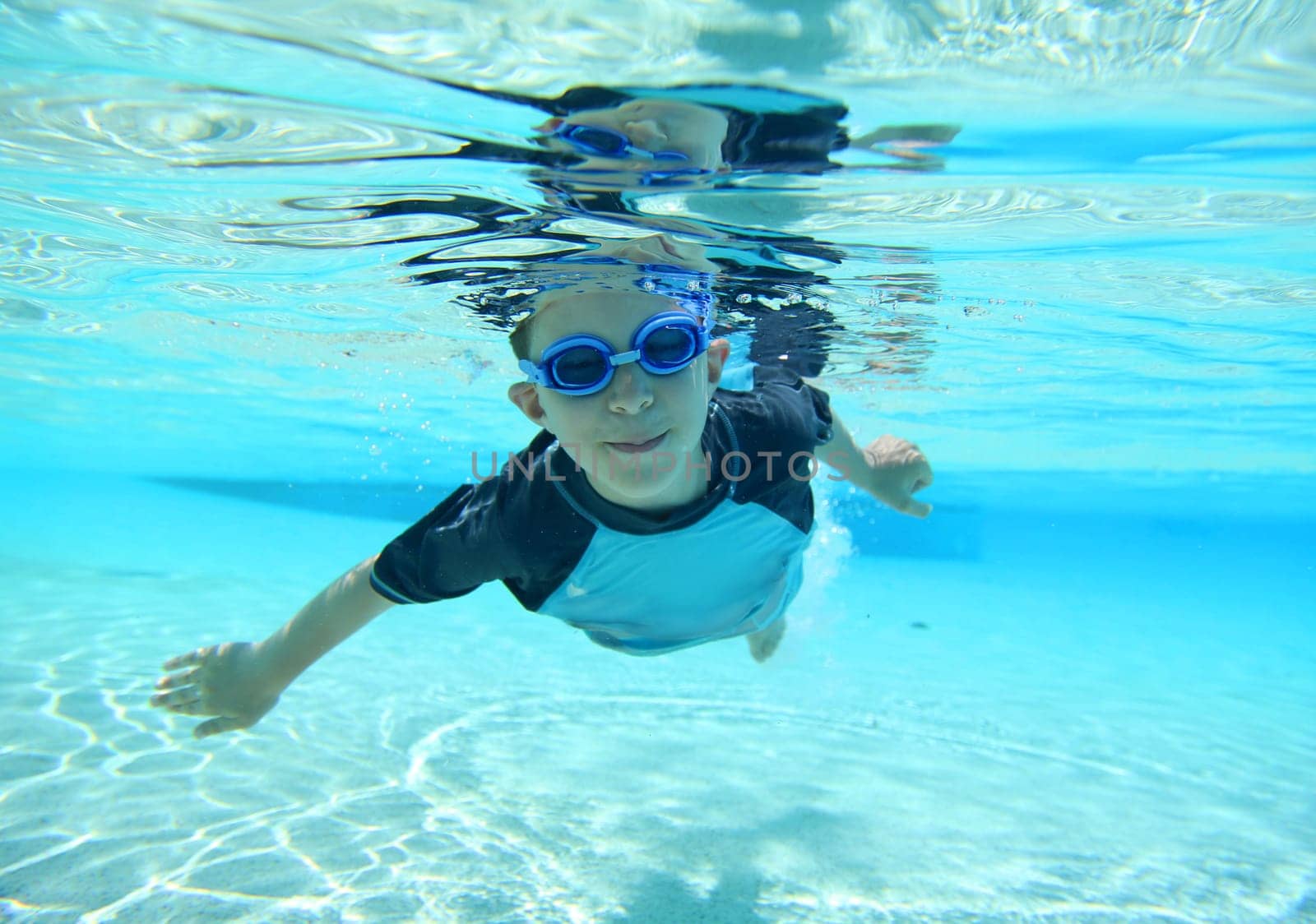 Underwater shot of boy swimming